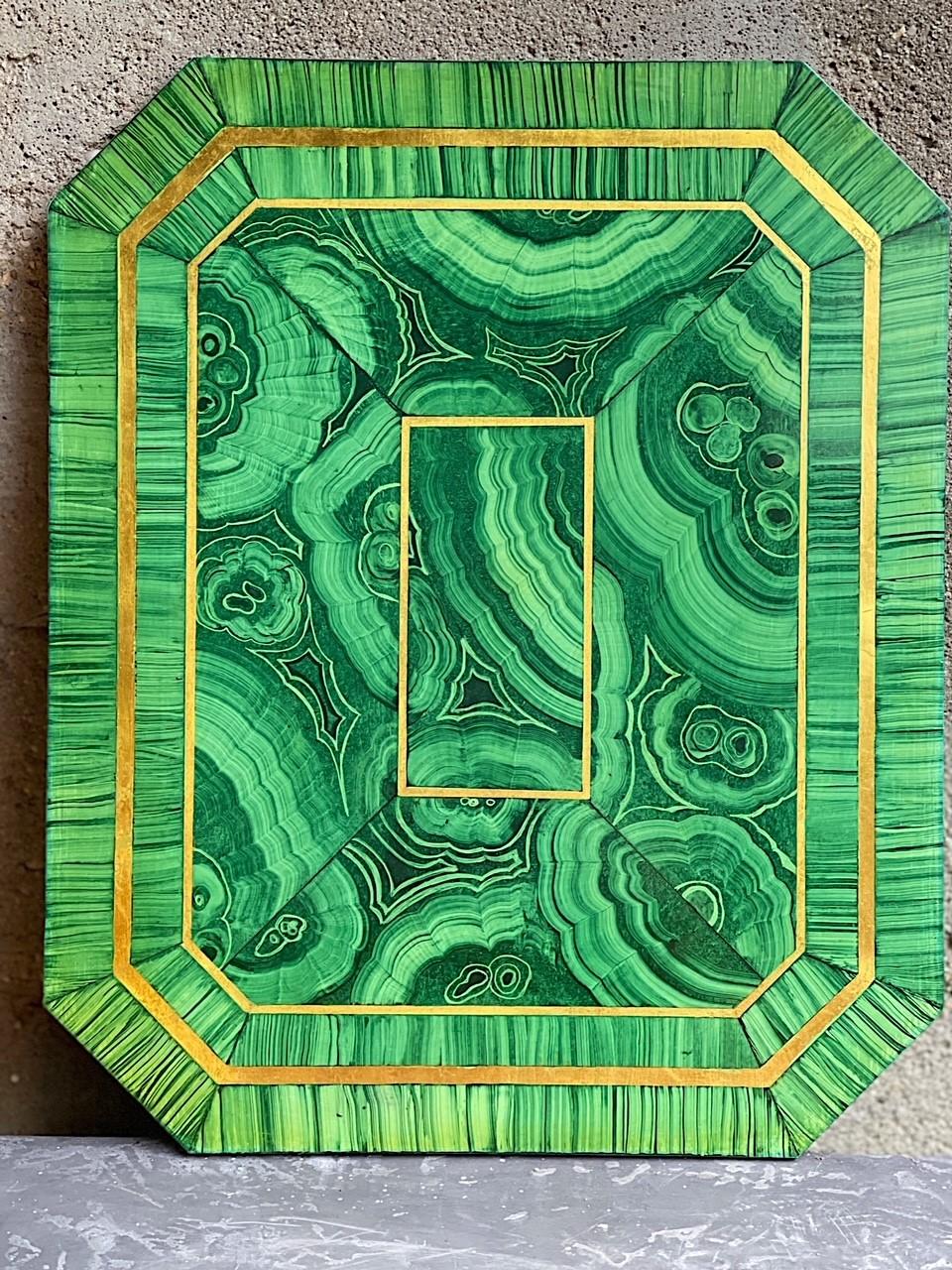 
Set of eight faux malachite placemats will add a stunning visual to any tabletop.. Each mat is uniquely hand-painted in richly hued mineral-tone pigments and gold gilt, sealed in a satin finished resin.

This item is part of the CABINE x WILDCRAFT