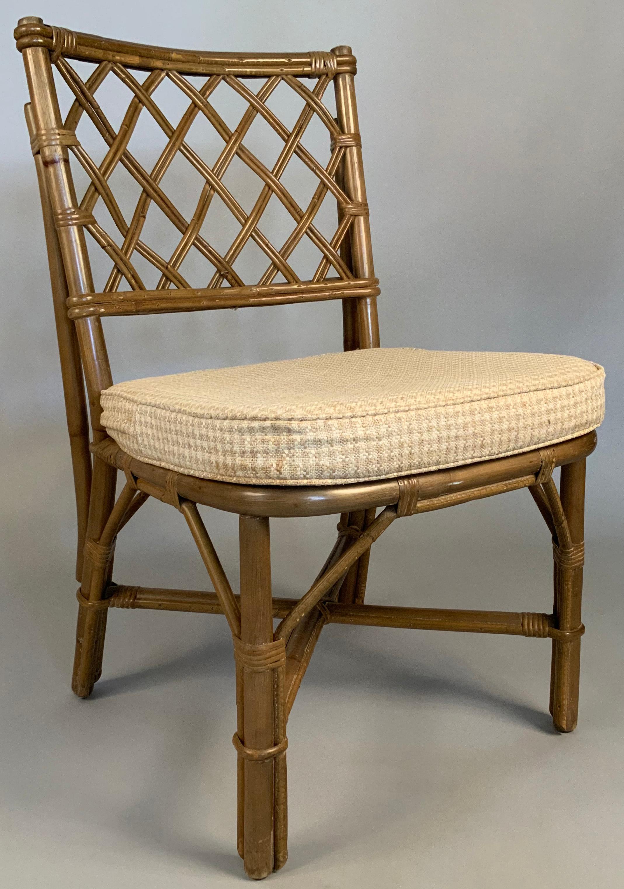 a very nice set of eight vintage 1960's rattan dining chairs by Ficks Reed, nice design and proportions, with lattice backs and reeded seats, in their original finish of beige with a hint of light green. 

the cushions are included but the covers