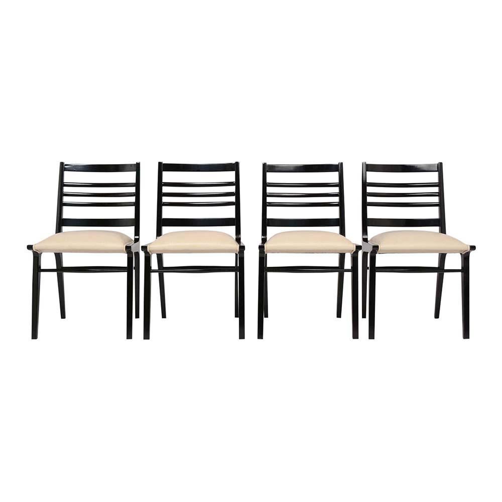 An extraordinary set of 8 Modern-style Dining Chairs crafted from maple wood has been professionally restored. This Daning chairs feature sleek design frame laddered backrests resting on stretched taper legs and has a newly ebonized lacquered
