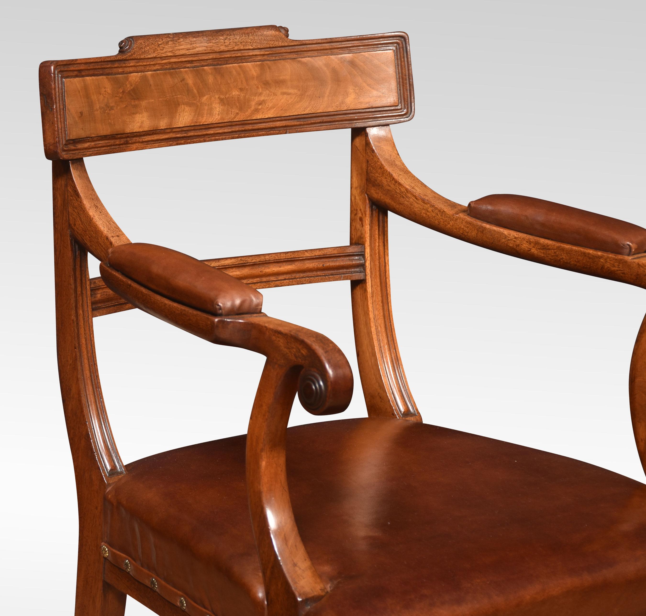 A set of eight Regency mahogany dining chairs. Comprising of two carvers and six chairs. Each with shaped top rail and central backrest, to the brown leather seats. All raised up on saber legs.
Dimensions
Armchairs
Height 33 Inches Height to seat
