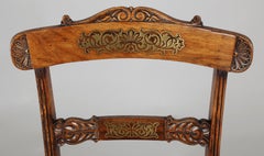 Set of Eight Regency Period Simulated Rosewood and Brass Inlaid Chairs