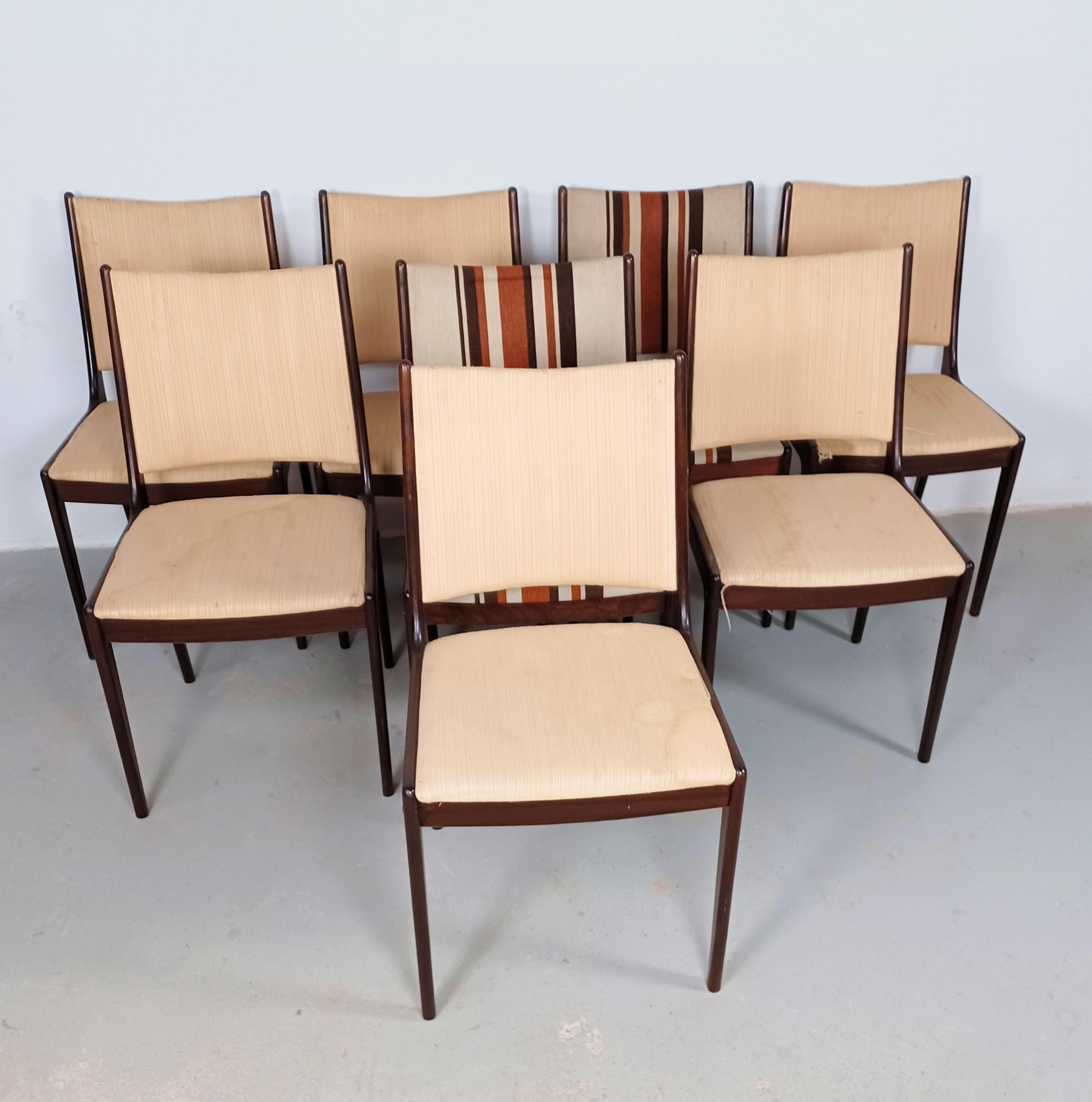 Set of Eight restored 1960s Johannes Andersen dining chairs in mahogany made by Uldum Møbler, Denmark including custom reupholstery.

The set of dining chairs feature a clean simple yet elegant design that will fit in well in many settings. 

The