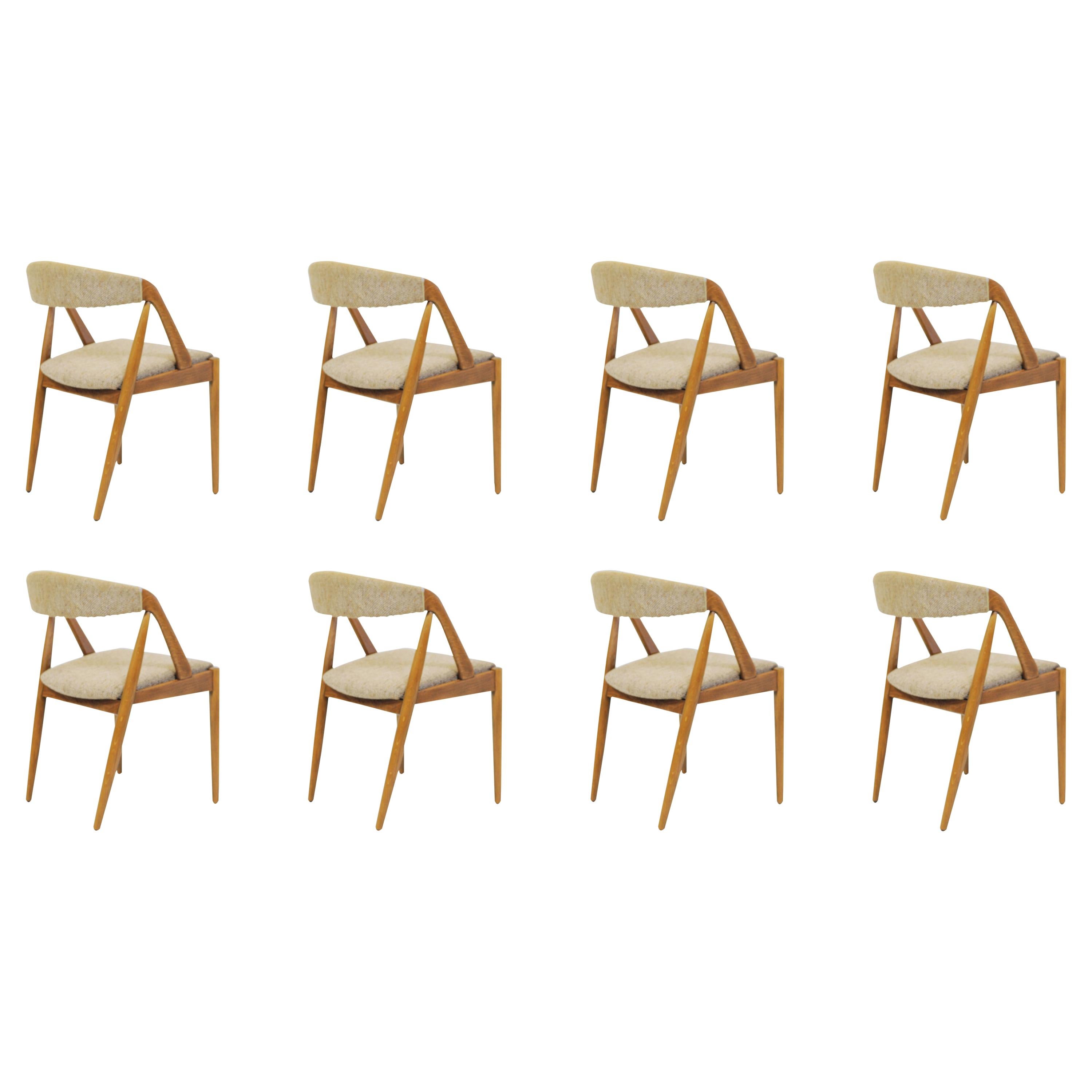 Set of Eight Restored Kai Kristiansen Dining Chairs in Oak, Inc. Reupholstery