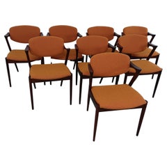 Set of Eight Restored Kai Kristiansen Rosewood Dining Chairs - Custom Upholstery