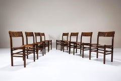 Ensemble de huit chaises de salle à manger Rivadossi avec dossiers sculptés en chêne Slavonian
