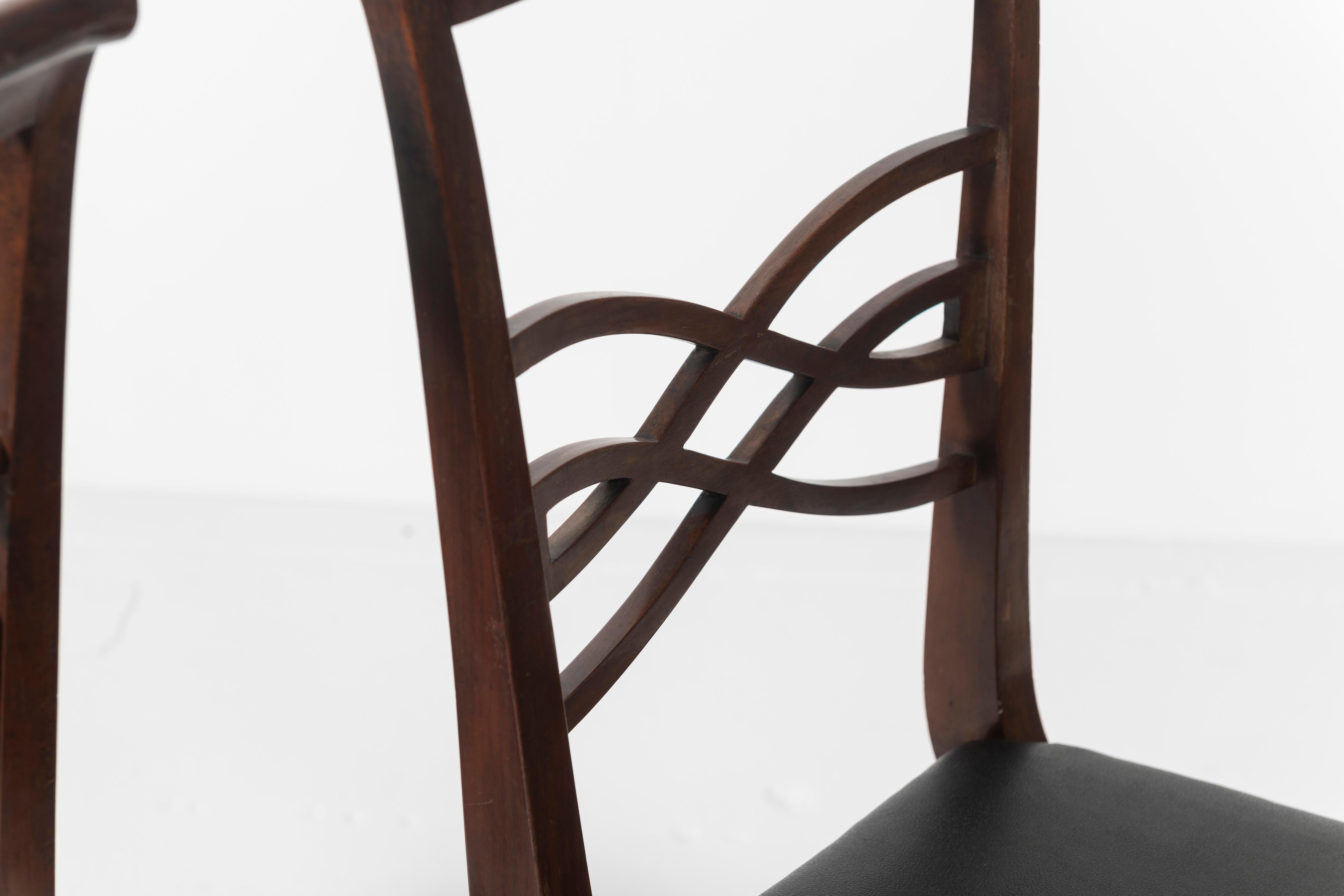 Set of Eight Rosewood Dining Chairs Covered in Vinyl with Brass Accents For Sale 6