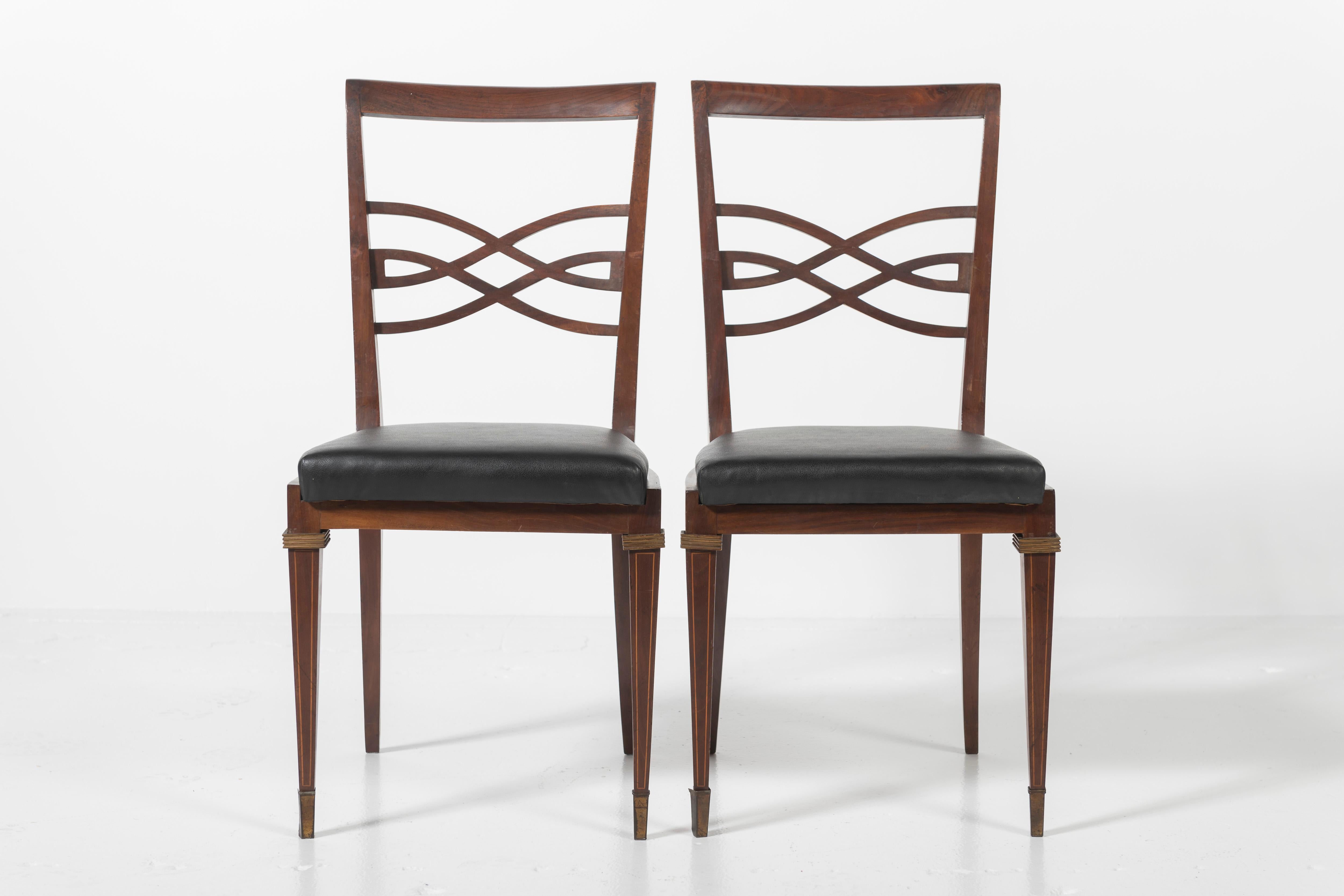 Art Deco Set of Eight Rosewood Dining Chairs Covered in Vinyl with Brass Accents For Sale