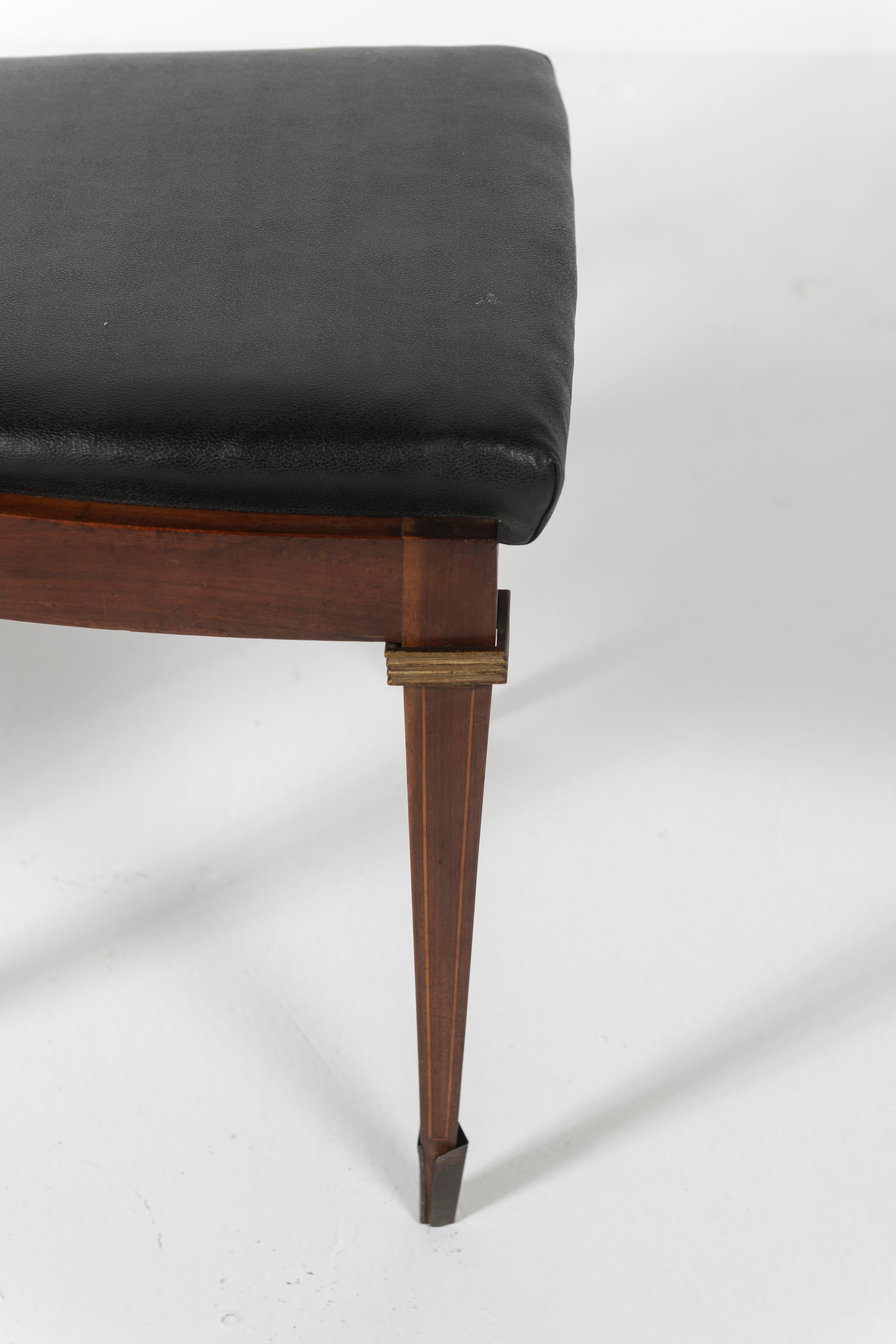 Set of Eight Rosewood Dining Chairs Covered in Vinyl with Brass Accents In Good Condition For Sale In San Francisco, CA