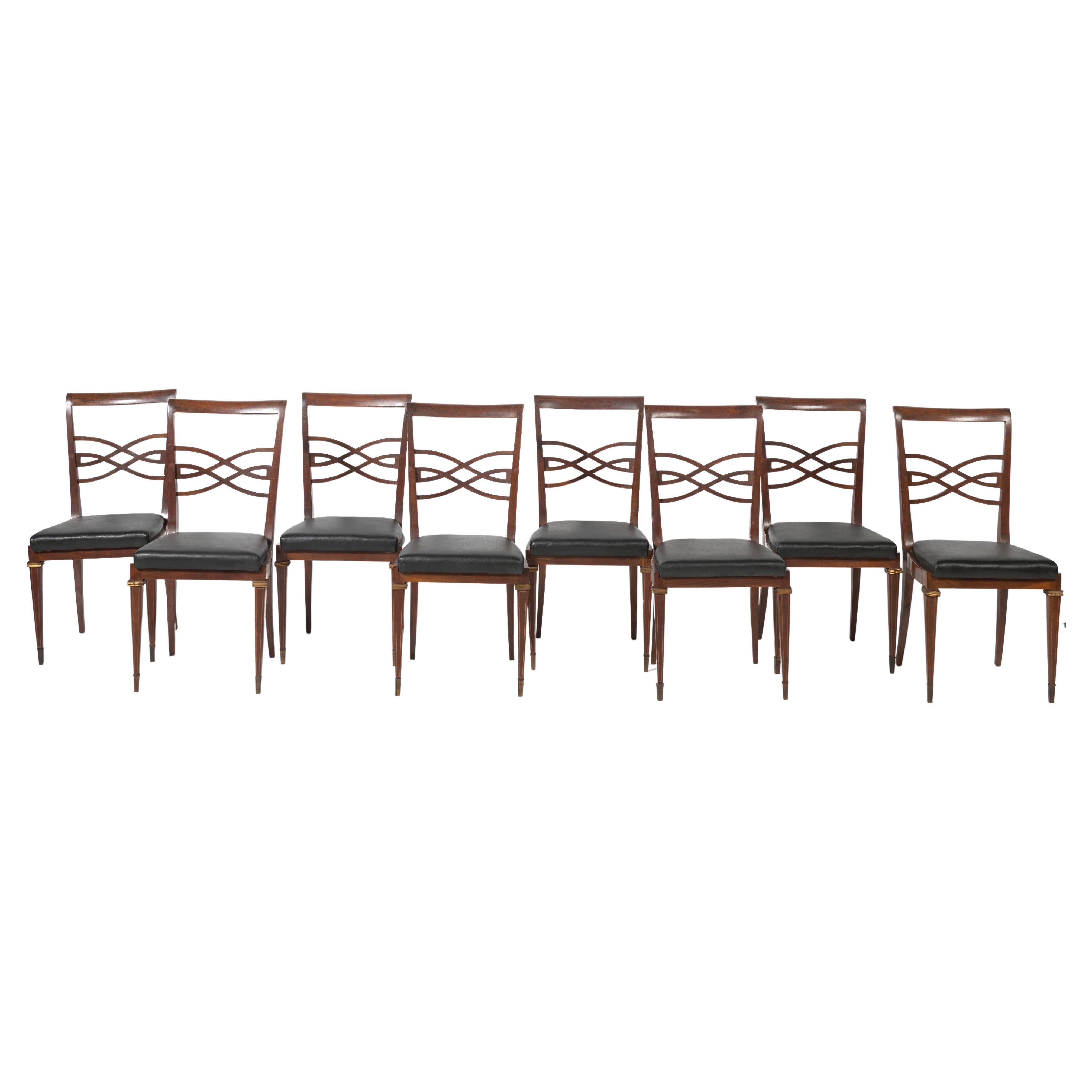 Set of Eight Rosewood Dining Chairs Covered in Vinyl with Brass Accents