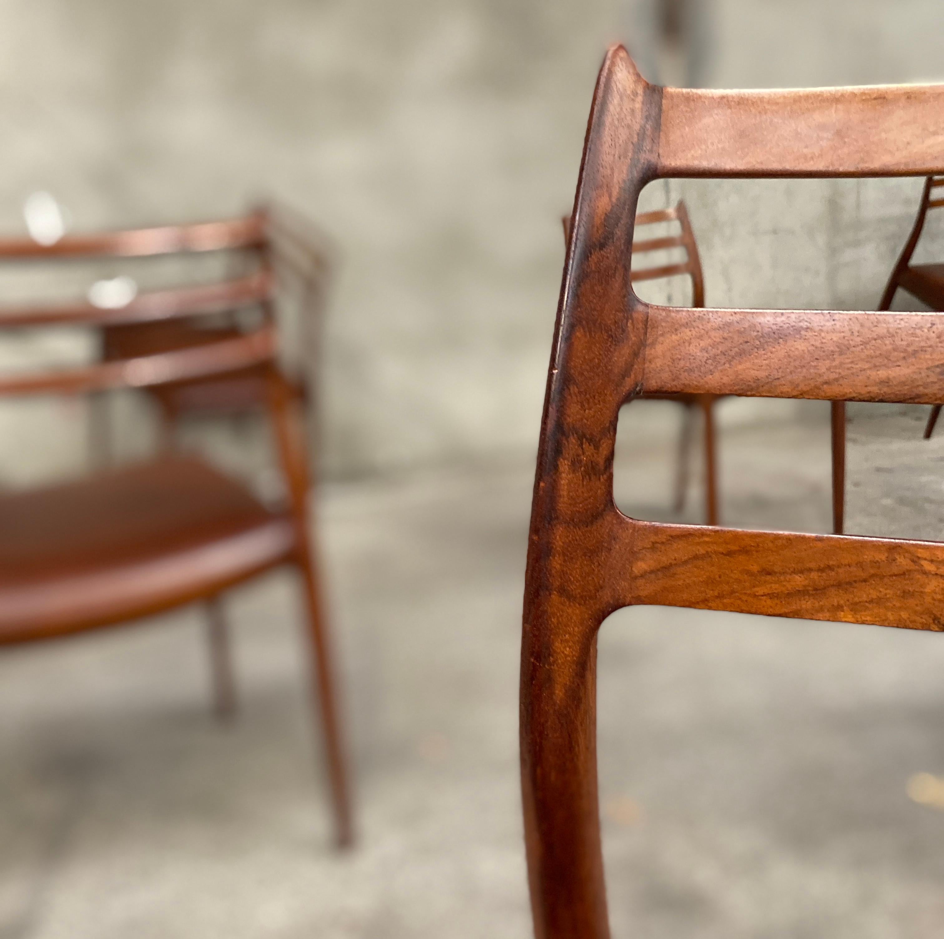 Mid-20th Century Set of Eight Rosewood Dining Chairs Designed by Niels O. Moller for J.L. Moller