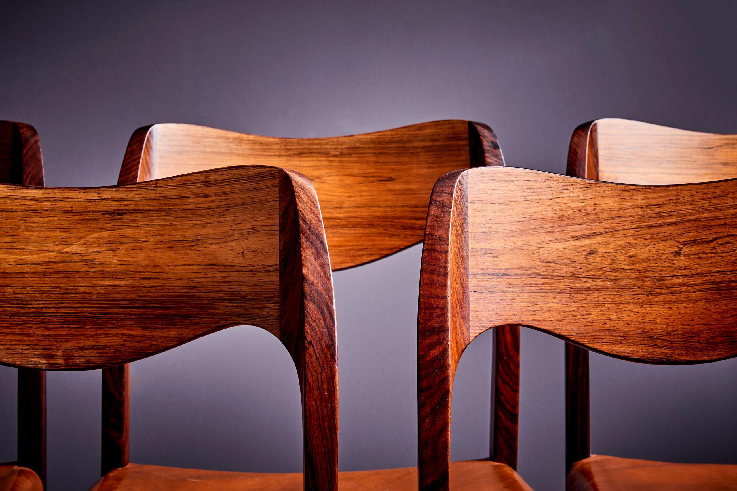 Stunning set of 8 dining chairs, model 71, designed by Niels O. Møller, made from rosewood and upholstered in leather, produced by J.L. Møller Møbelfabrik in Denmark during the 1960s. Niels O. Møller, born in 1920, began his journey as a
