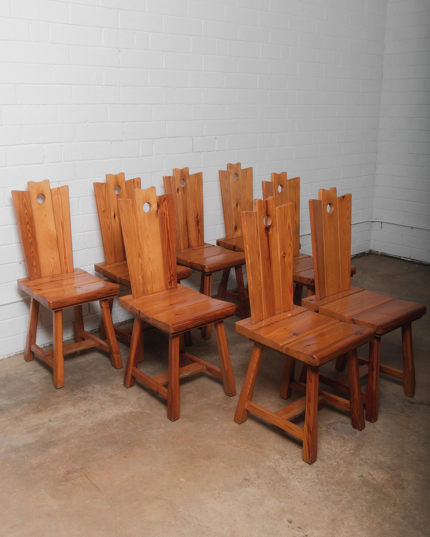 European Set of Eight Rustic Alpine-Style Pine Dining Chairs For Sale