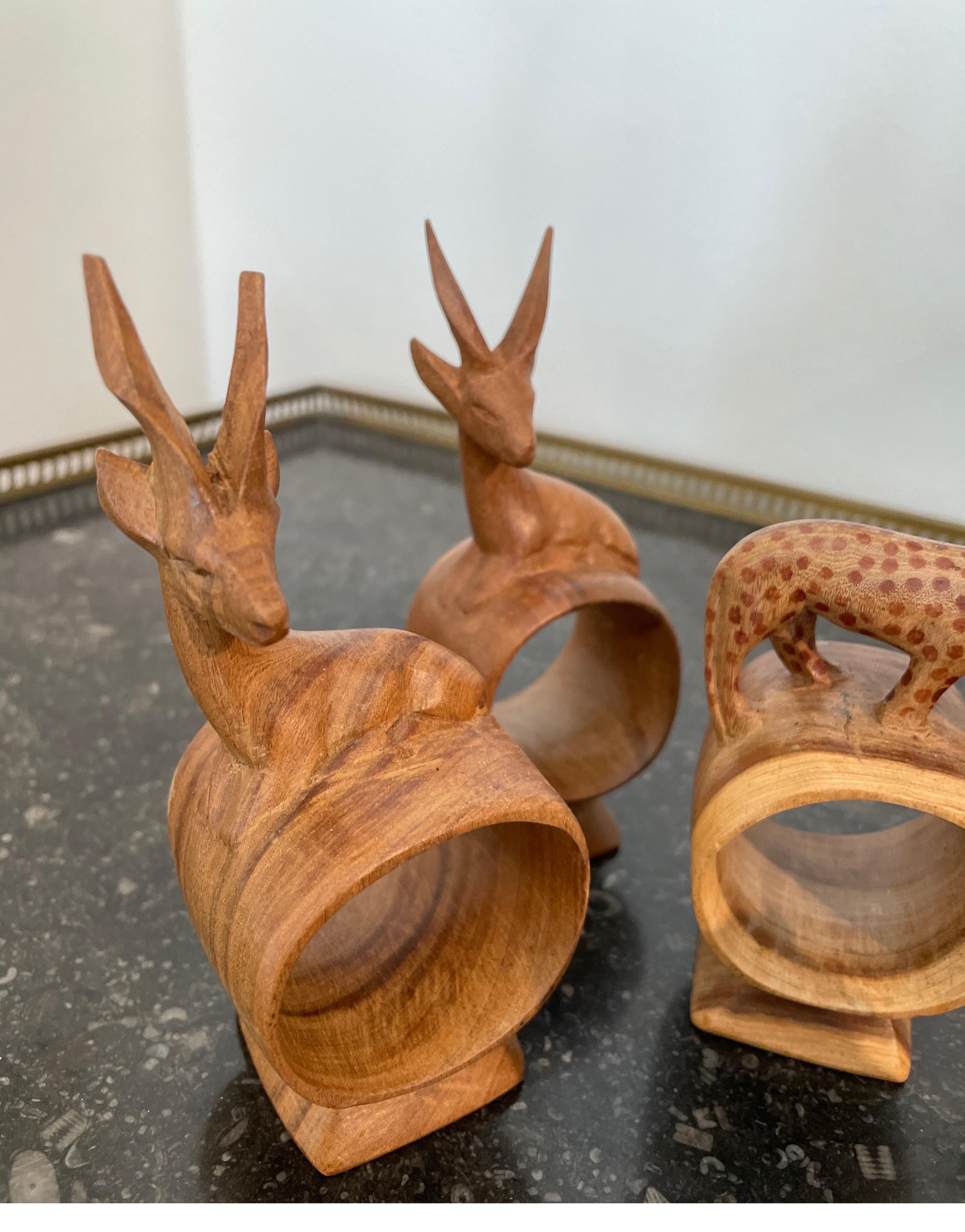 Wood Set of Eight Safari Themed Hand Carved Napkin Rings