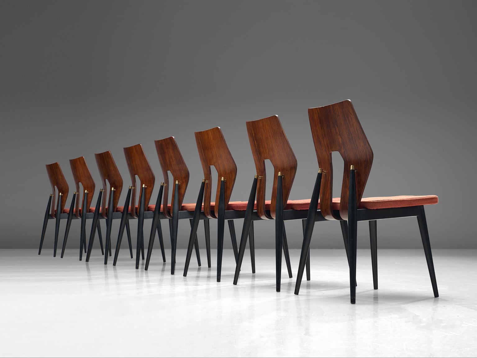 Meredew, set of 8 dining chairs, rosewood, brass, wood and fabric, United Kingdom, 1960s.

These Meredew 1960s dining chairs will make an elegant addition to your dining room. Their wonderfully sculpted backs are finished on both sides with