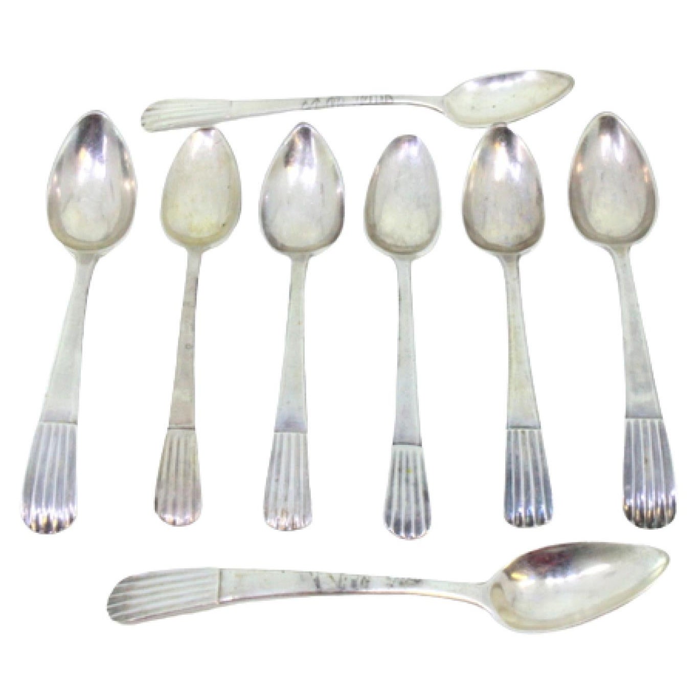 Set of eight silver teaspoons in the caninhas style