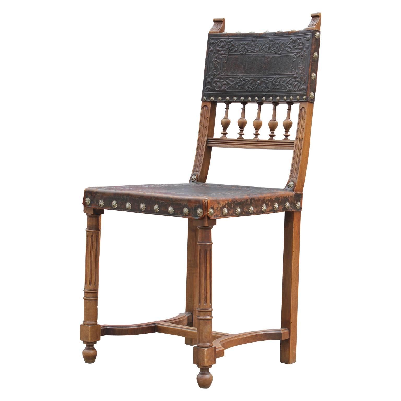 Spanish Colonial Set of Eight Spanish Brown Embossed Leather Walnut Dining Chairs
