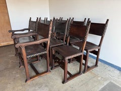 Set of Ten Spanish Revival Leather Dining Chairs, circa 1920s