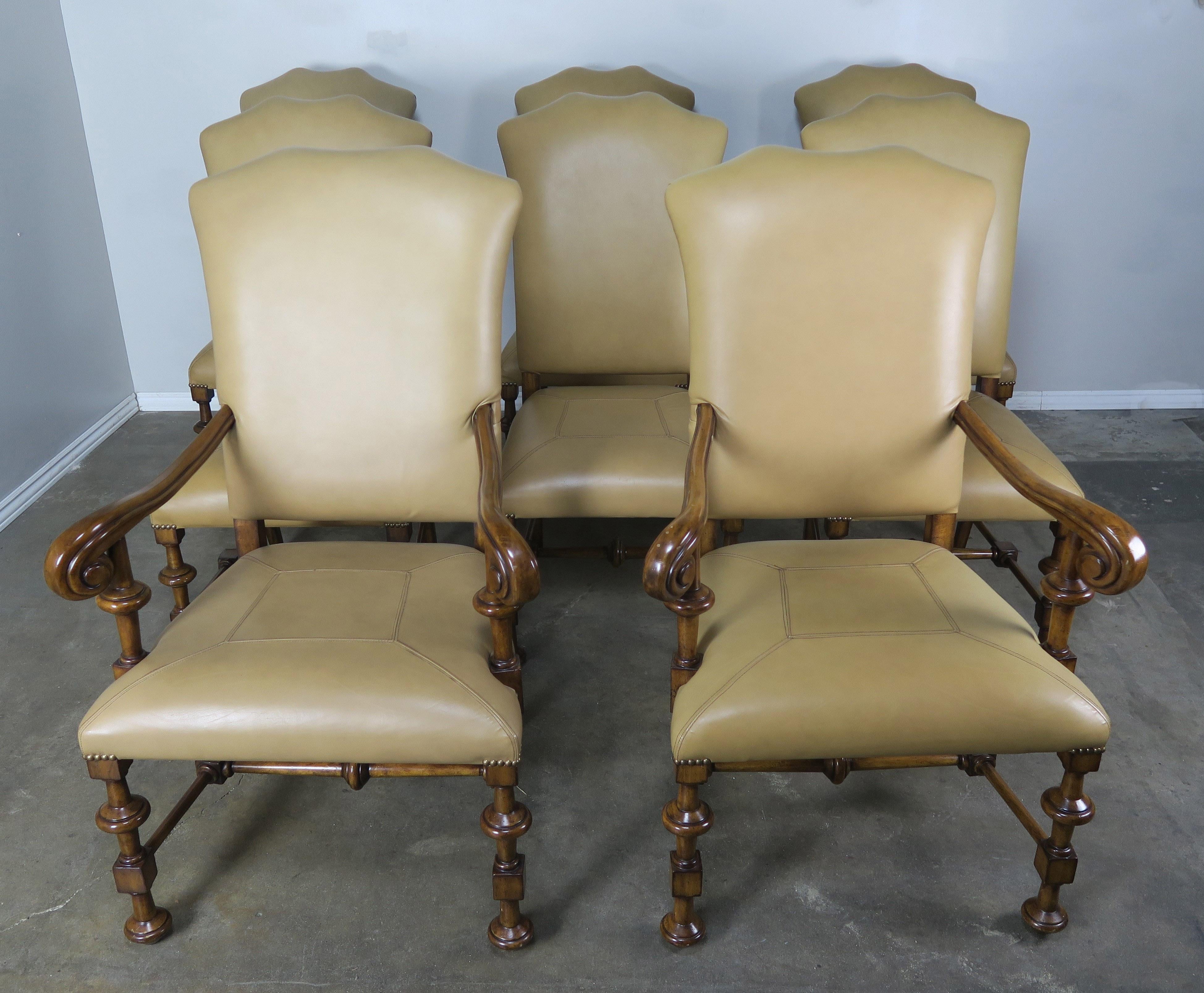 Set of eight Spanish walnut leather dining chairs. The chairs are beautifully upholstered in camel colored leather with beautifully shaped backs and baseball stitched seats.
Armchairs size: 27.5