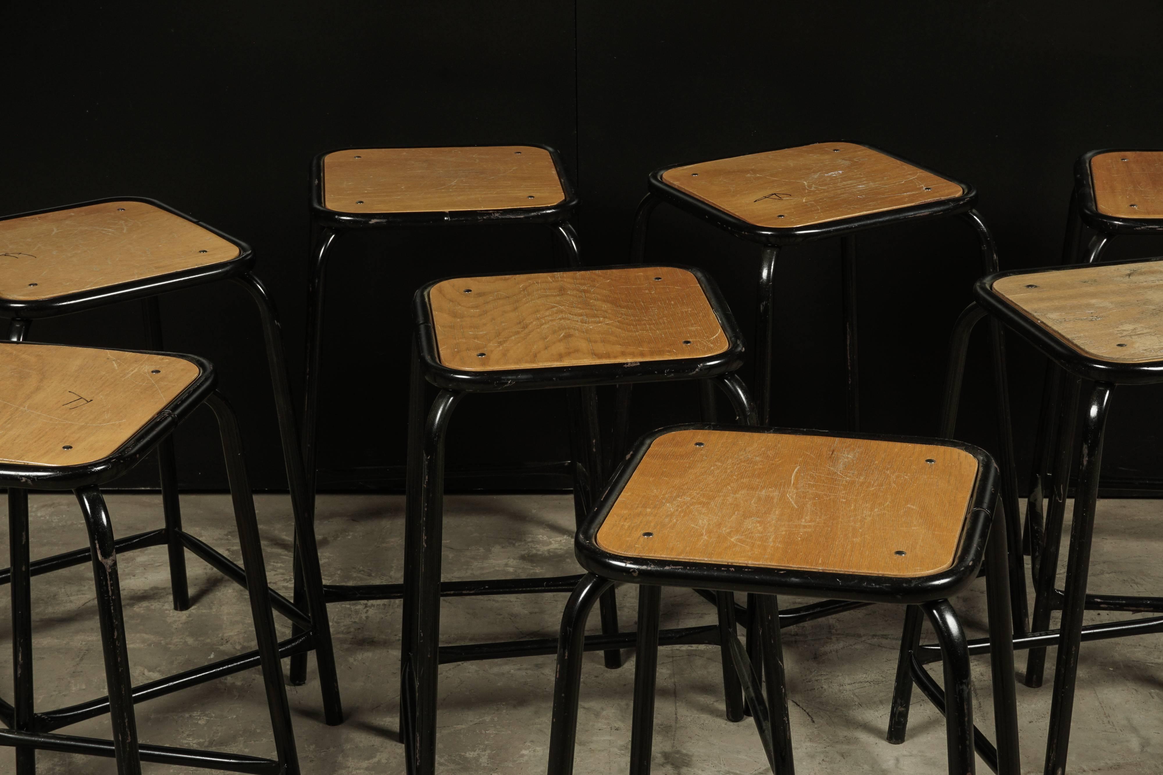Set of eight stacking counter stools from Belgium, circa 1970.