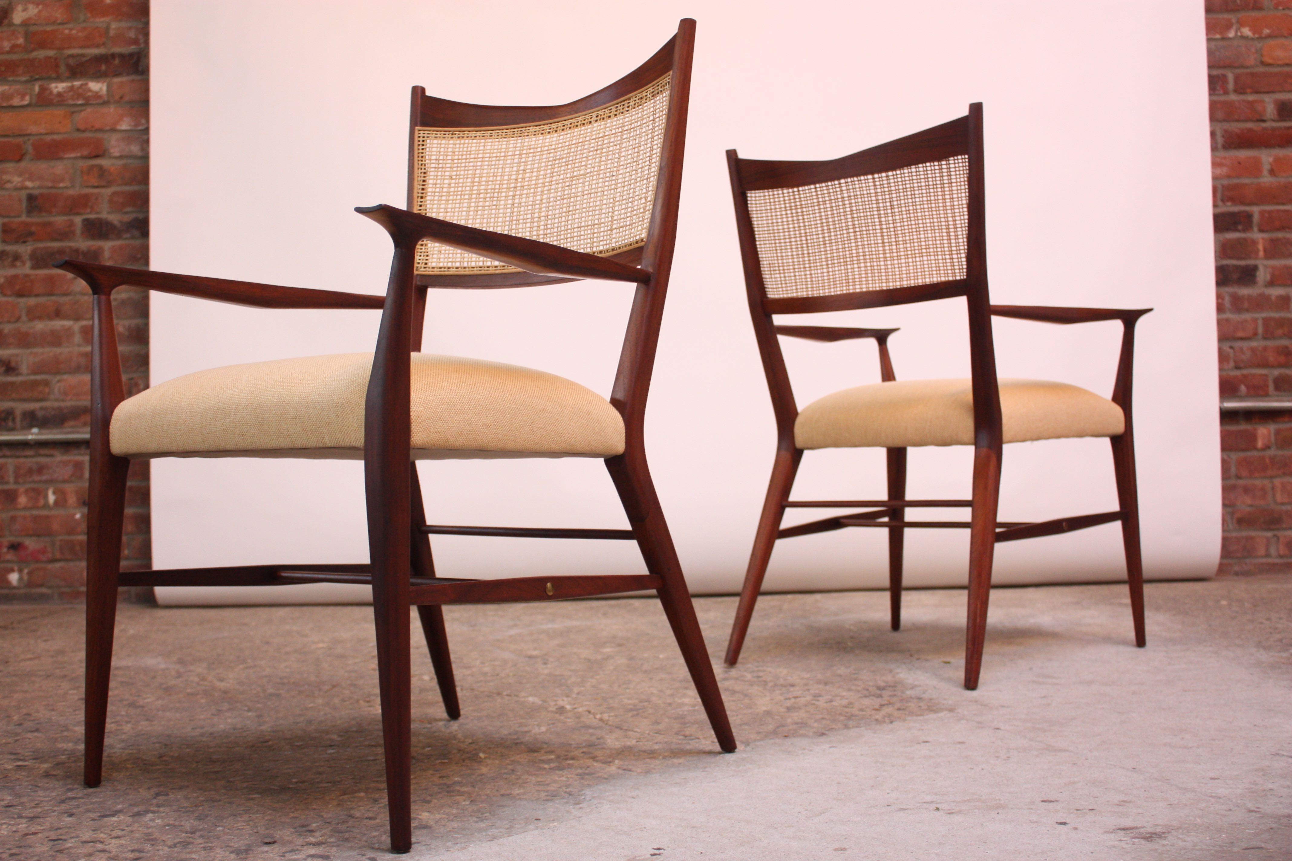 Mid-20th Century Set of Eight Stained Mahogany and Cane Directional Dining Chairs by Paul McCobb