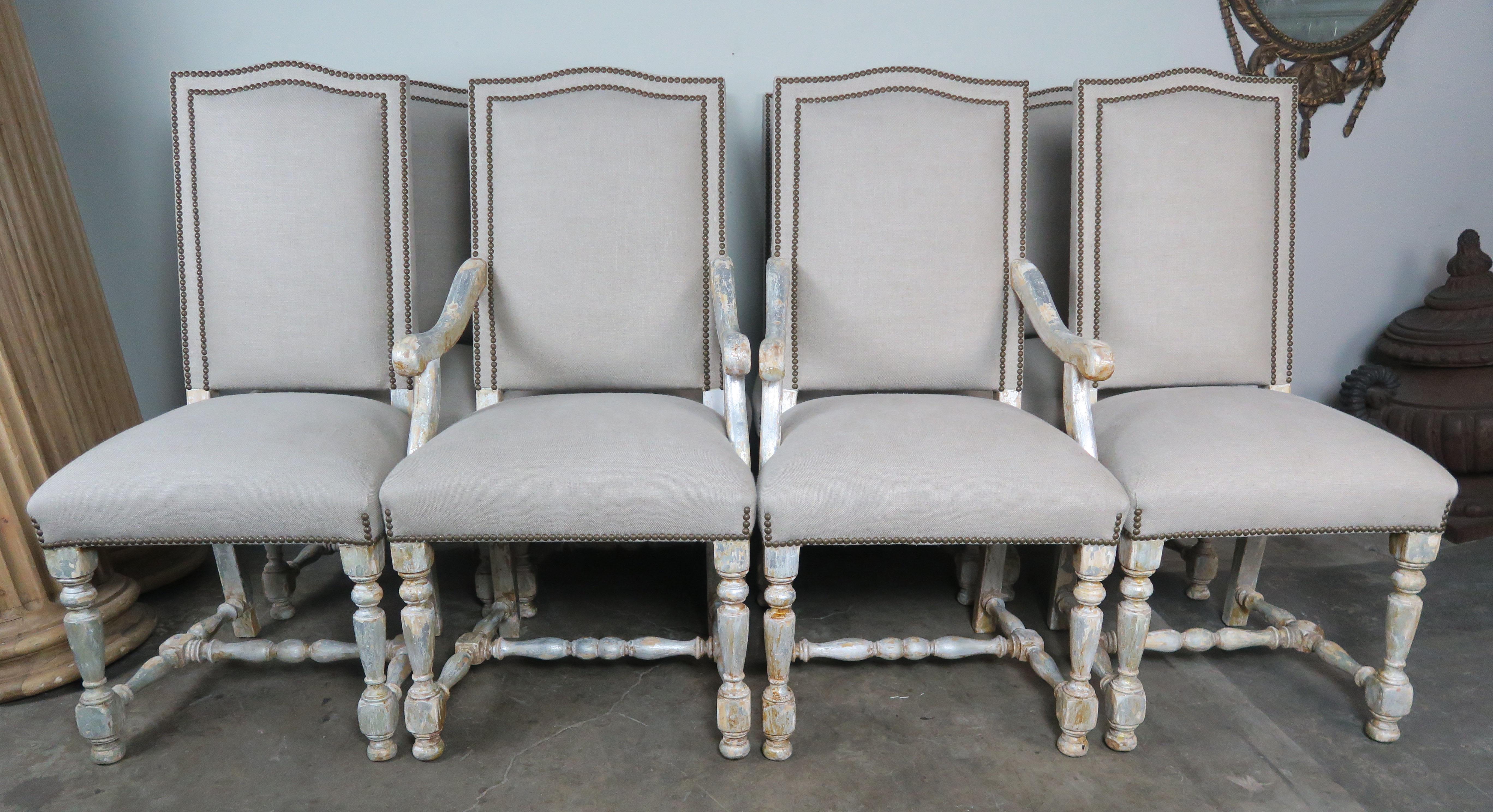 Set of eight Swedish silvered and painted dining chairs that are newly reupholstered in a soft washed Belgium linen upholstery with a double row of nailheads.
Measures: 21