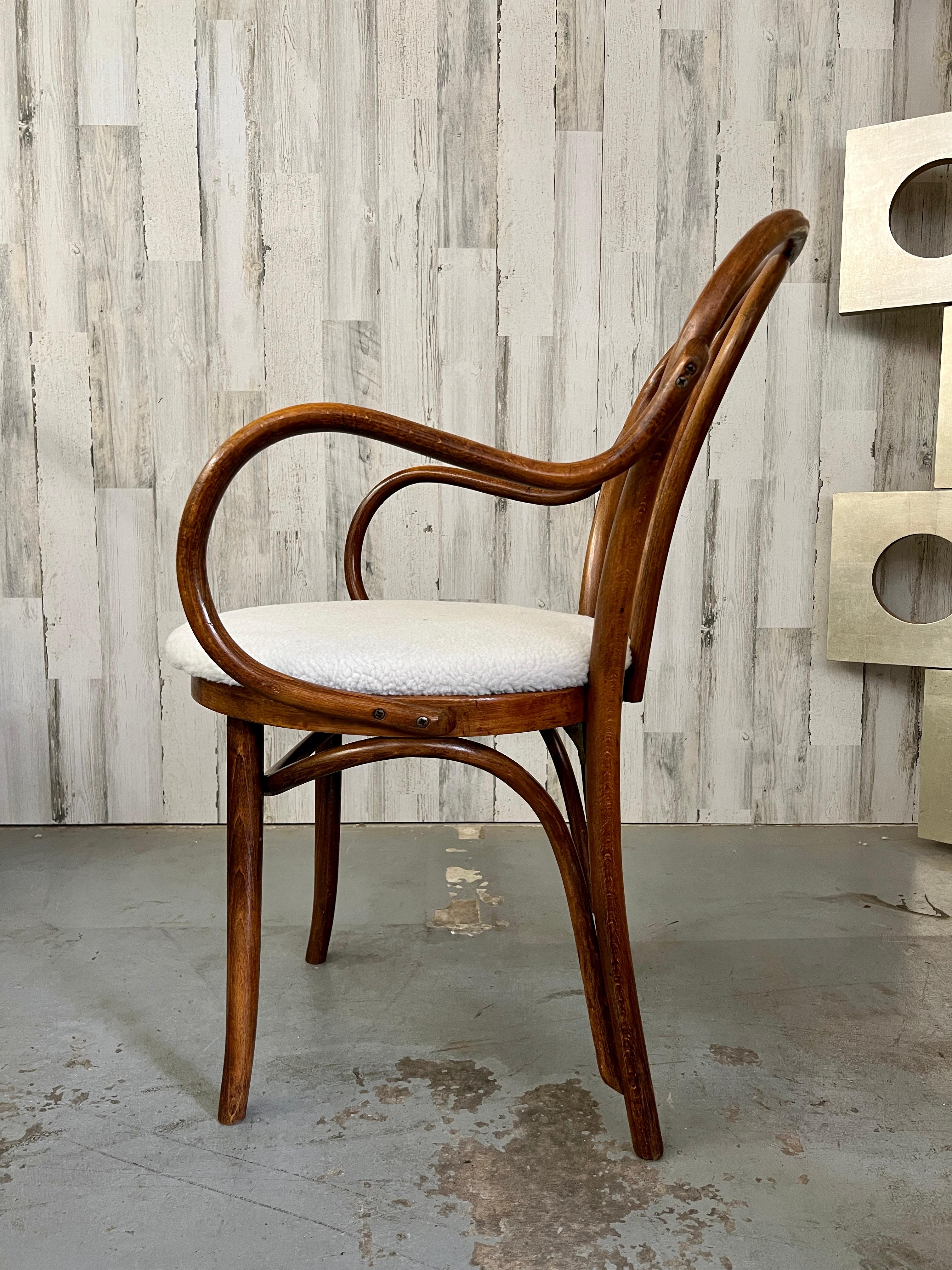 Set of Eight Thonet Arm Chairs 11