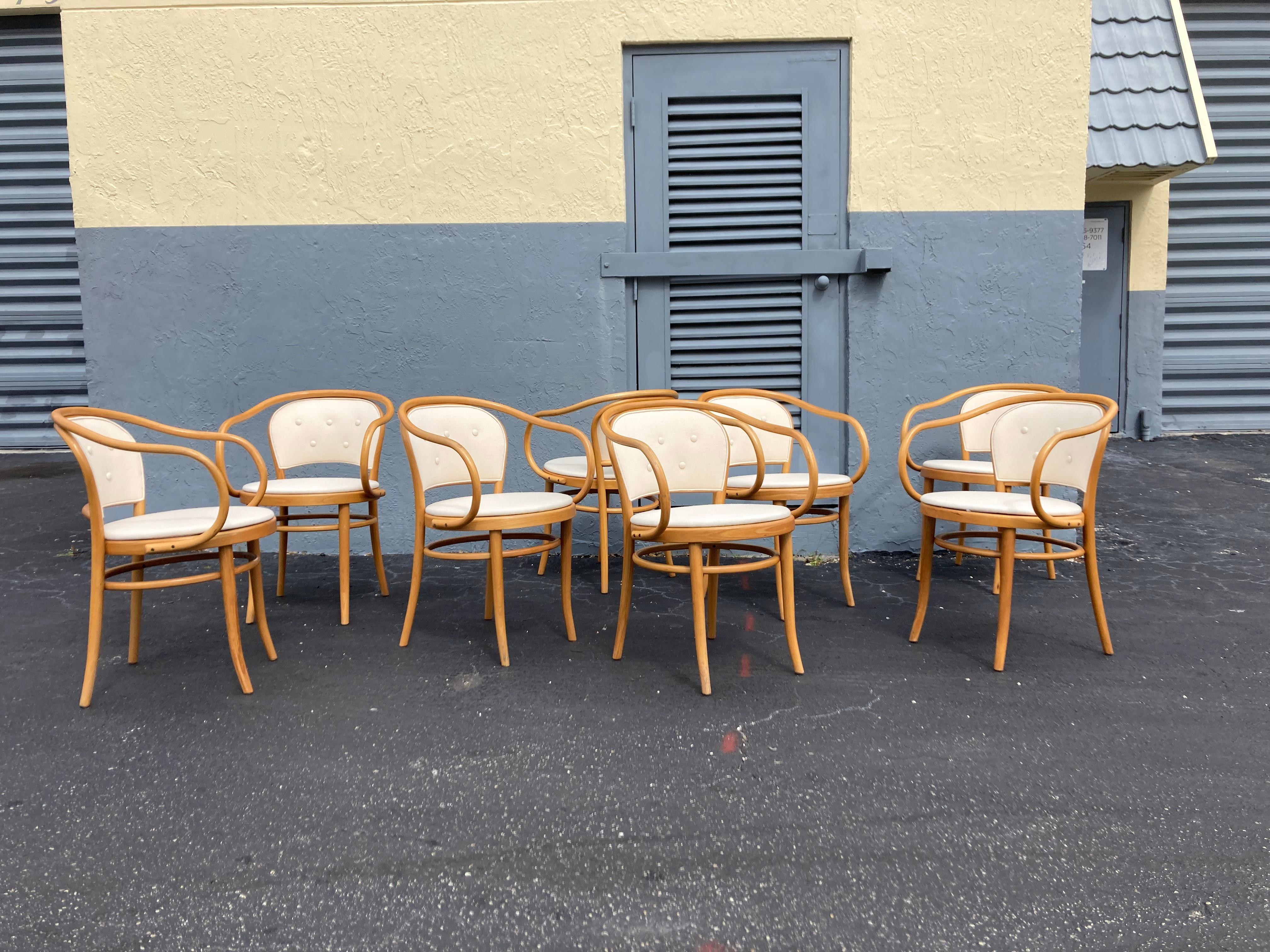 Beautiful set of eight thonet chairs 210. Chairs have been recovered with Knoll fabric. Chairs are signed. Manufactured in 1984.