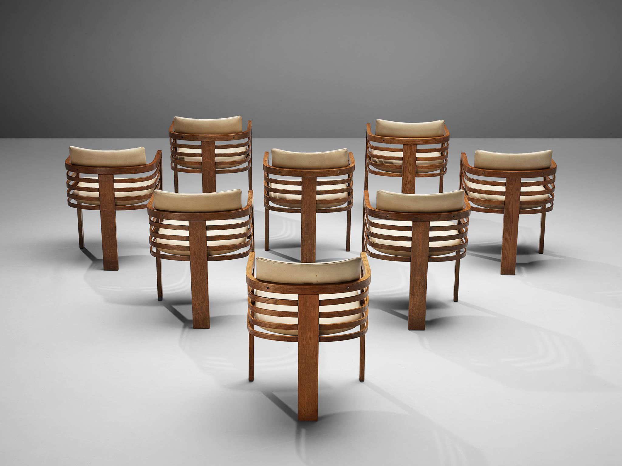 Set of eight dining chairs, oak, off-white leather, Italy, 1960s

Very nice set of geometrical dining room chairs. These chairs have a characteristic design that is simple, but very strong in lines and proportions. Thanks to the wonderful dynamic