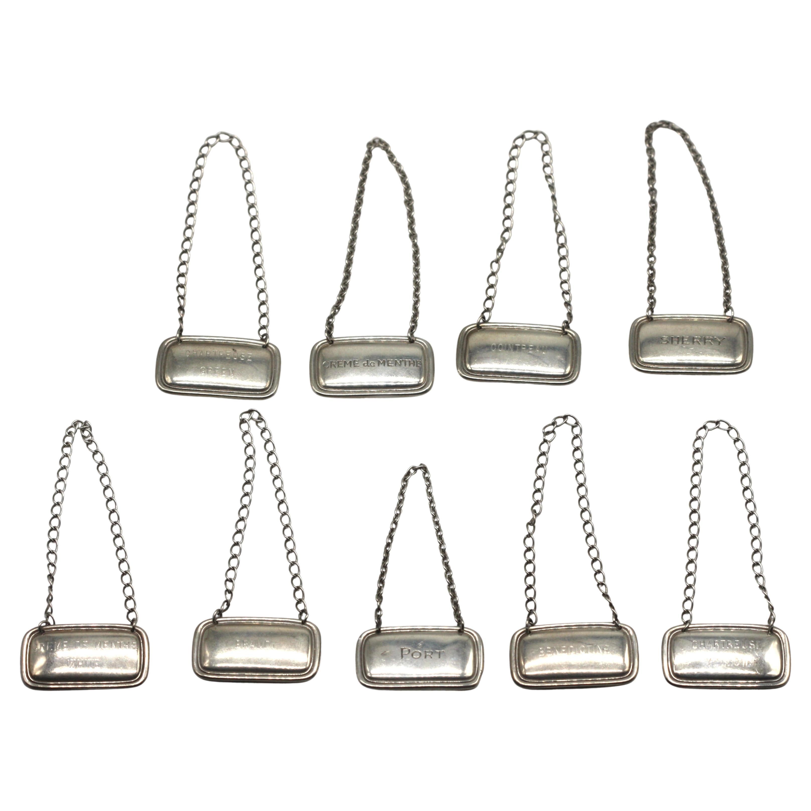 Set di otto Tiffany & Co. Etichette per decanter in argento Sterling Americano, circa 1930 in vendita