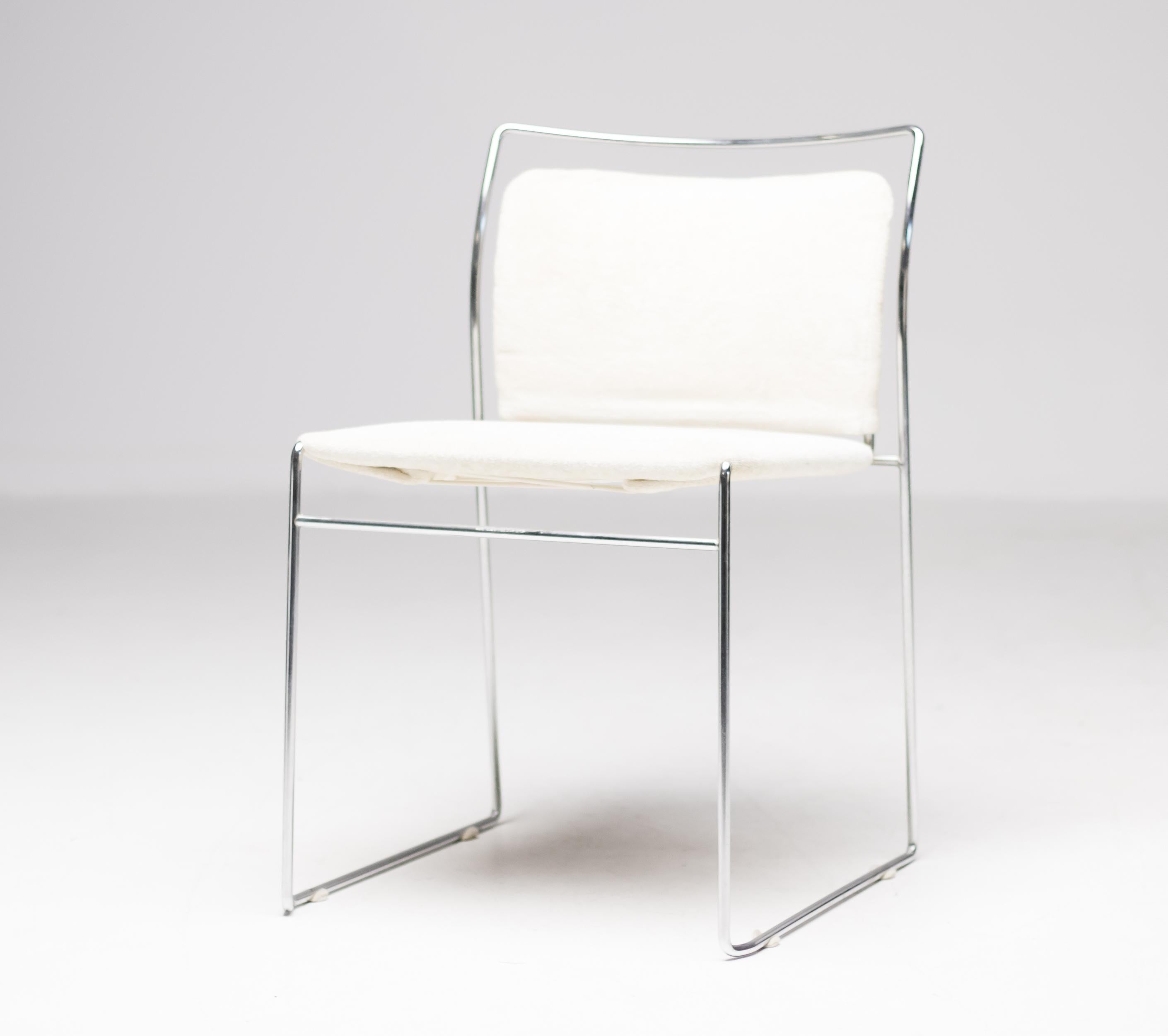 The Tulu chair was designed by the Japanese designer Kazuhide Takahama for Simon International in 1966. 
The Tulu is one of the very first models that paved the way for the use of chrome-plated steel rod. The steel rod makes it possible to produce