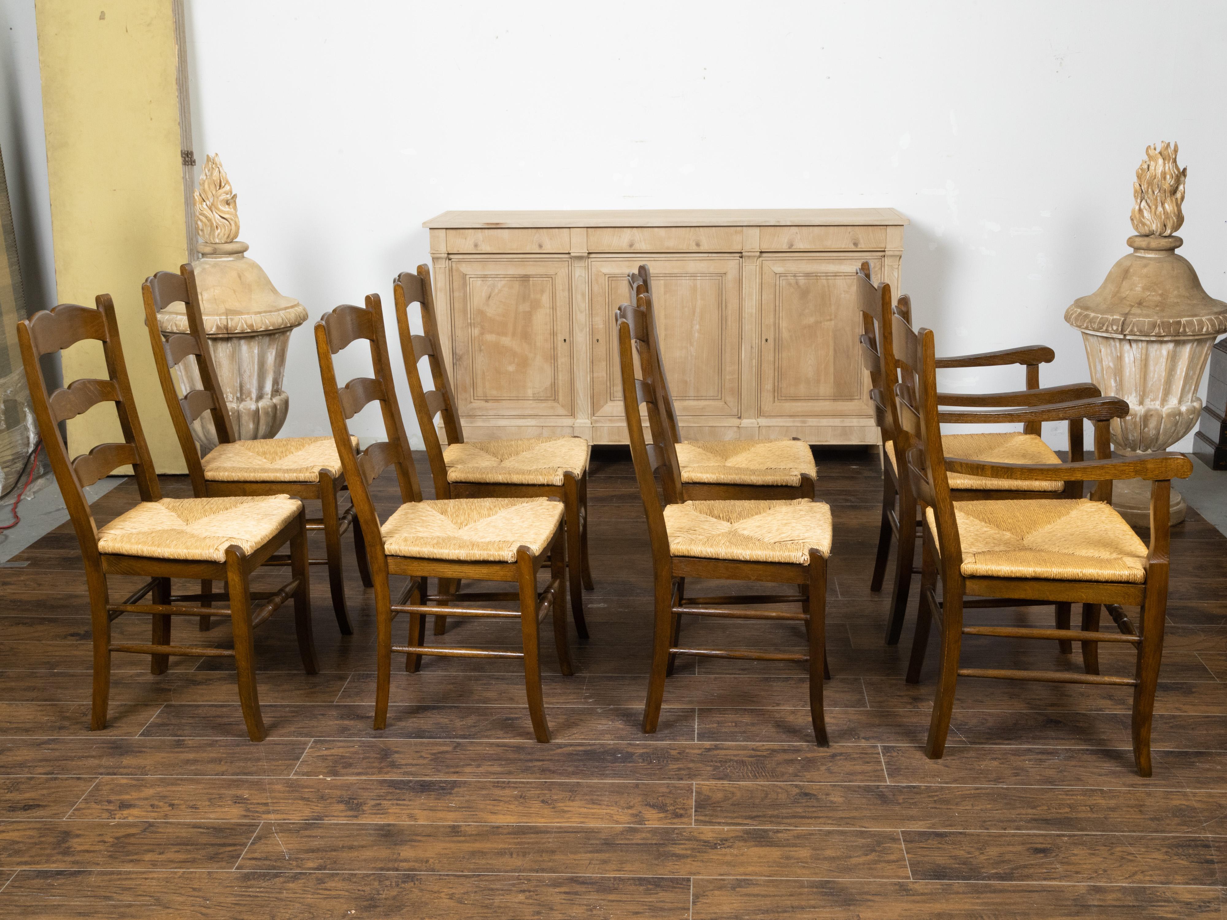 English Set of Eight Turn of the Century Oak Ladderback Dining Chairs with Rush Seats For Sale