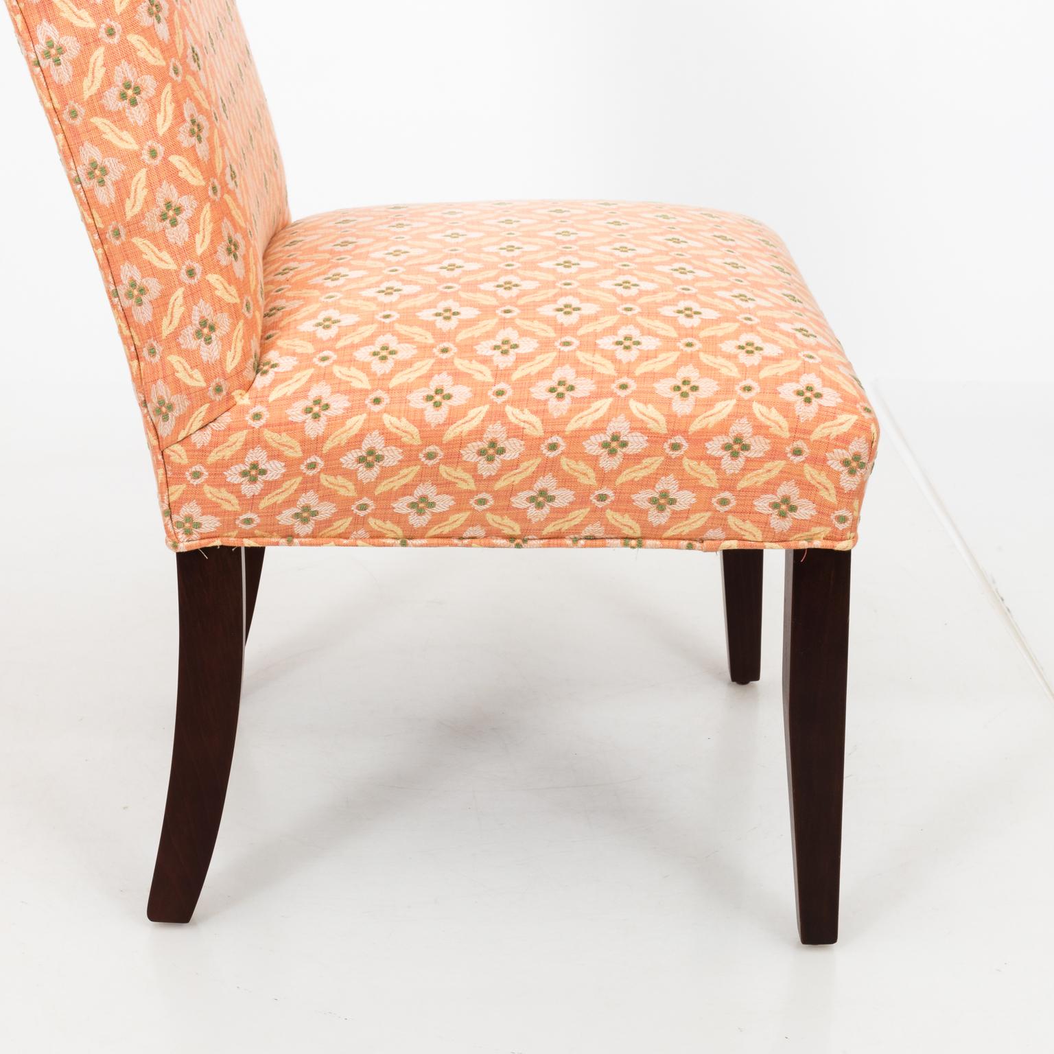 Set of eight upholstered custom dining chairs in Brunschwig & Fils fabric.