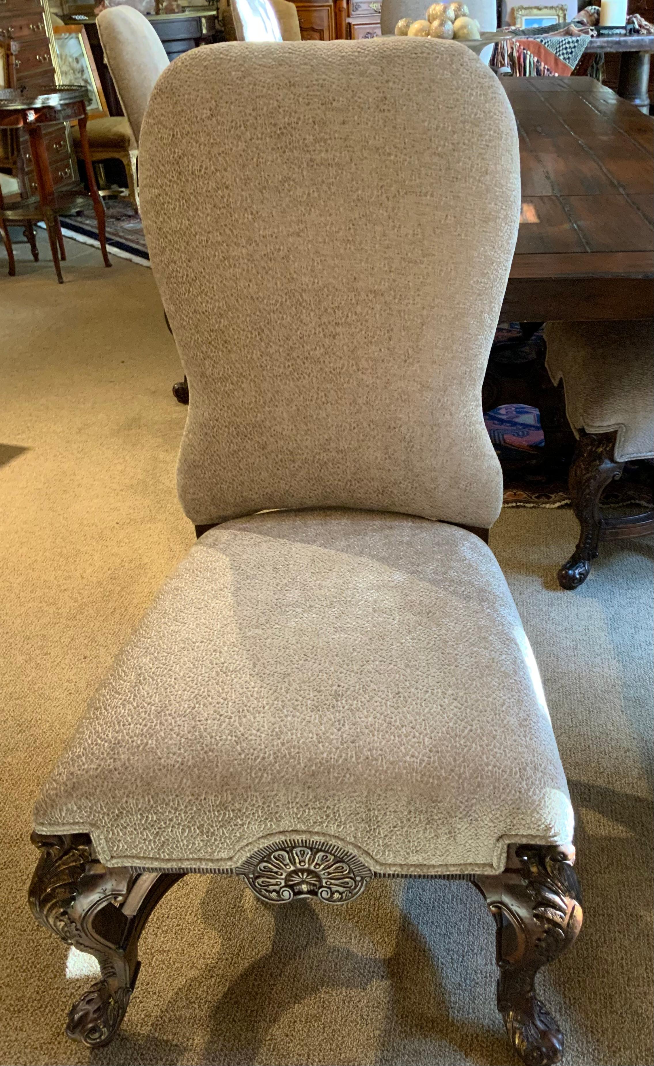 These chairs are comfortable with new upholstery and have padding 
That is well cushioned and yet firm enough for the best support to
Both the seat and back. The fabric is in a cream/gray hue which is a
Neutral that blends with many interior