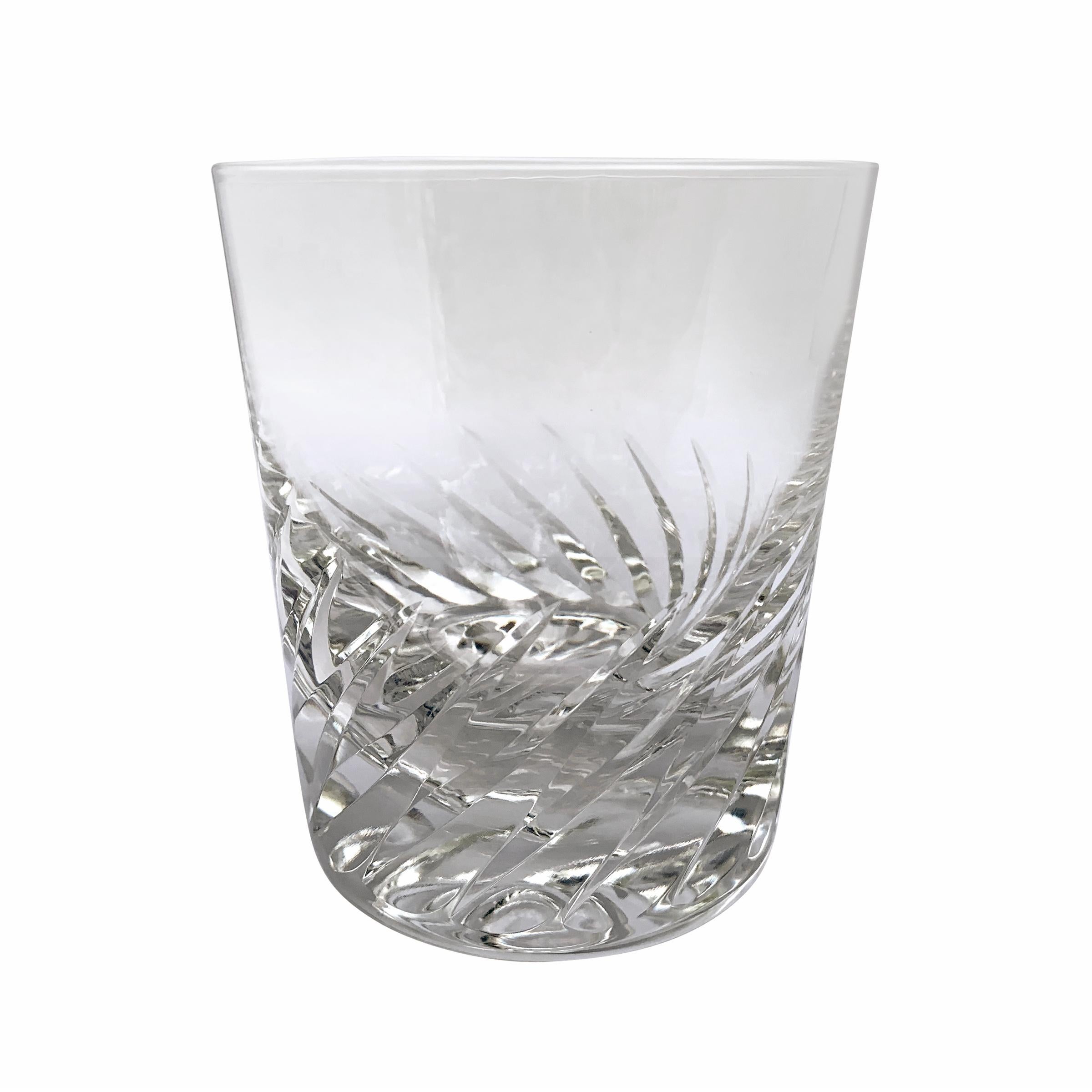 A wonderful set of eight early 20th century Belgian Val St. Lambert Gevaert Arlene pattern crystal double old fashioned cocktail glass with a simple cut swirl pattern.
