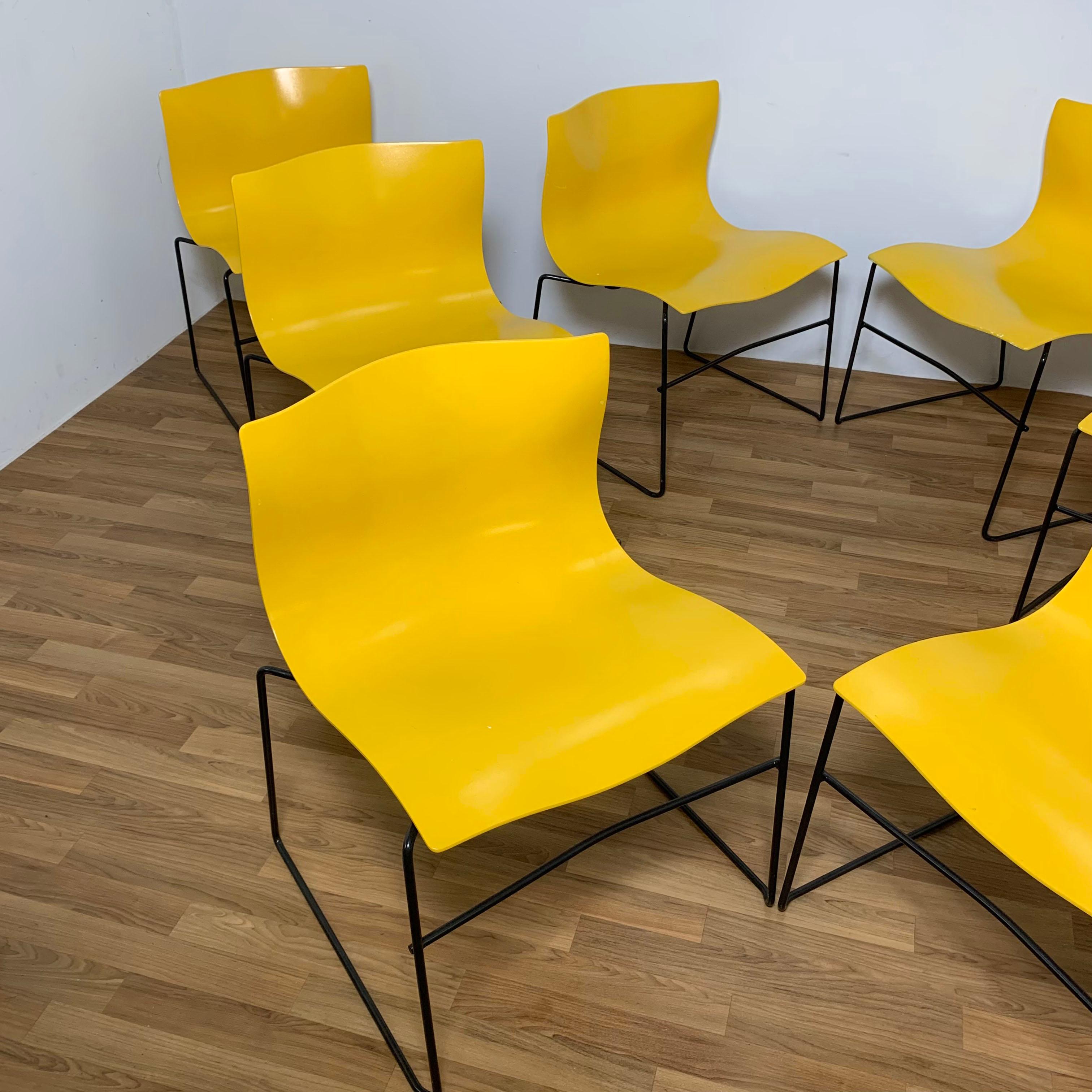 A set of eight early production (1985) handkerchief chairs designed by Massimo and Lella Vignelli for Knoll. The one piece seats and back were intended to evoke a handkerchief in the breeze. The design was first introduced in 1983 and the entire set