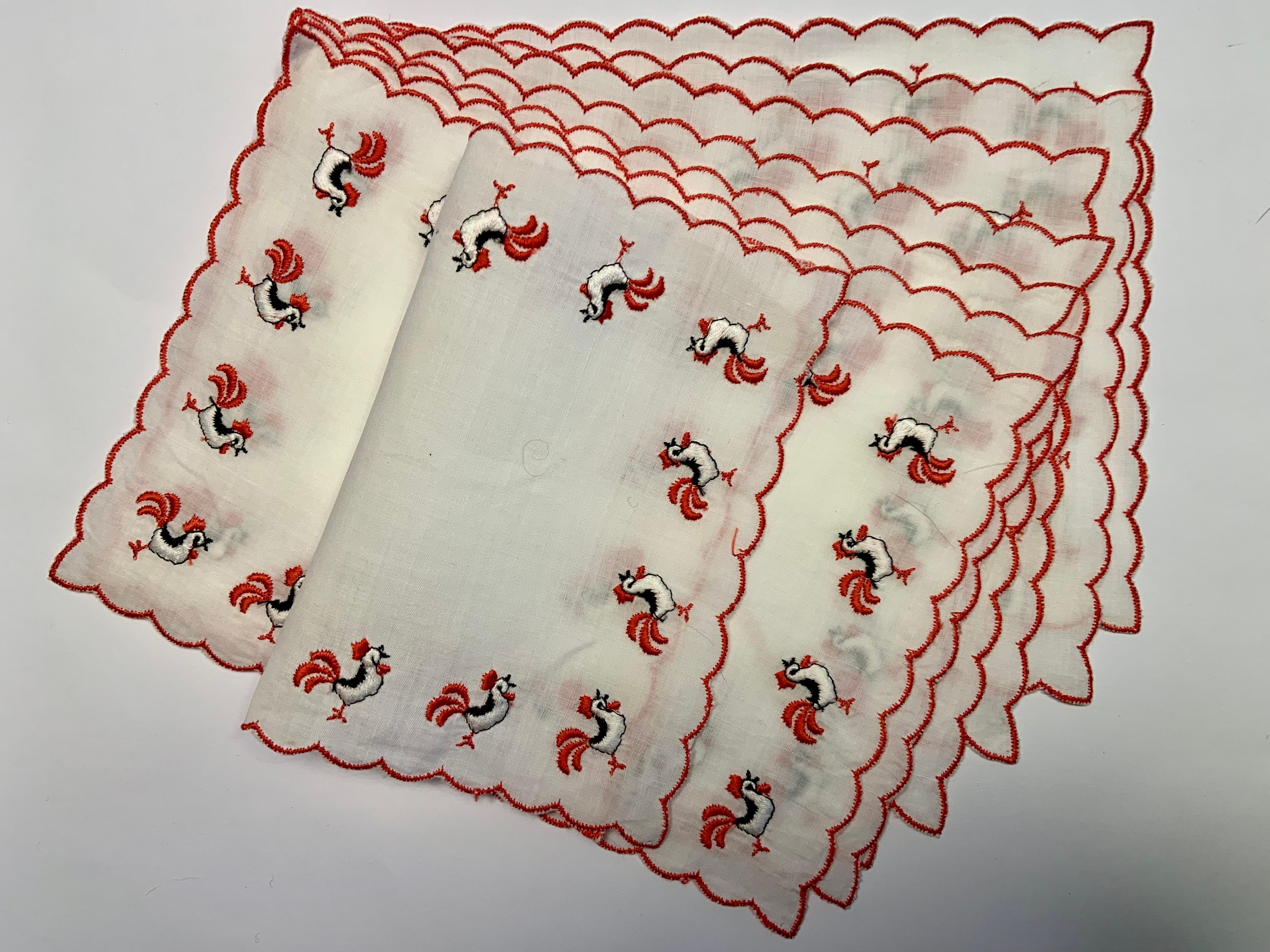 The rooster is the unofficial mascot of cocktails, seen on napkins, glasses and cocktail shakers.  This set of eight cocktail napkins has red scalloped edges and embroidered red, white and black roosters on all four sides.  They are in excellent