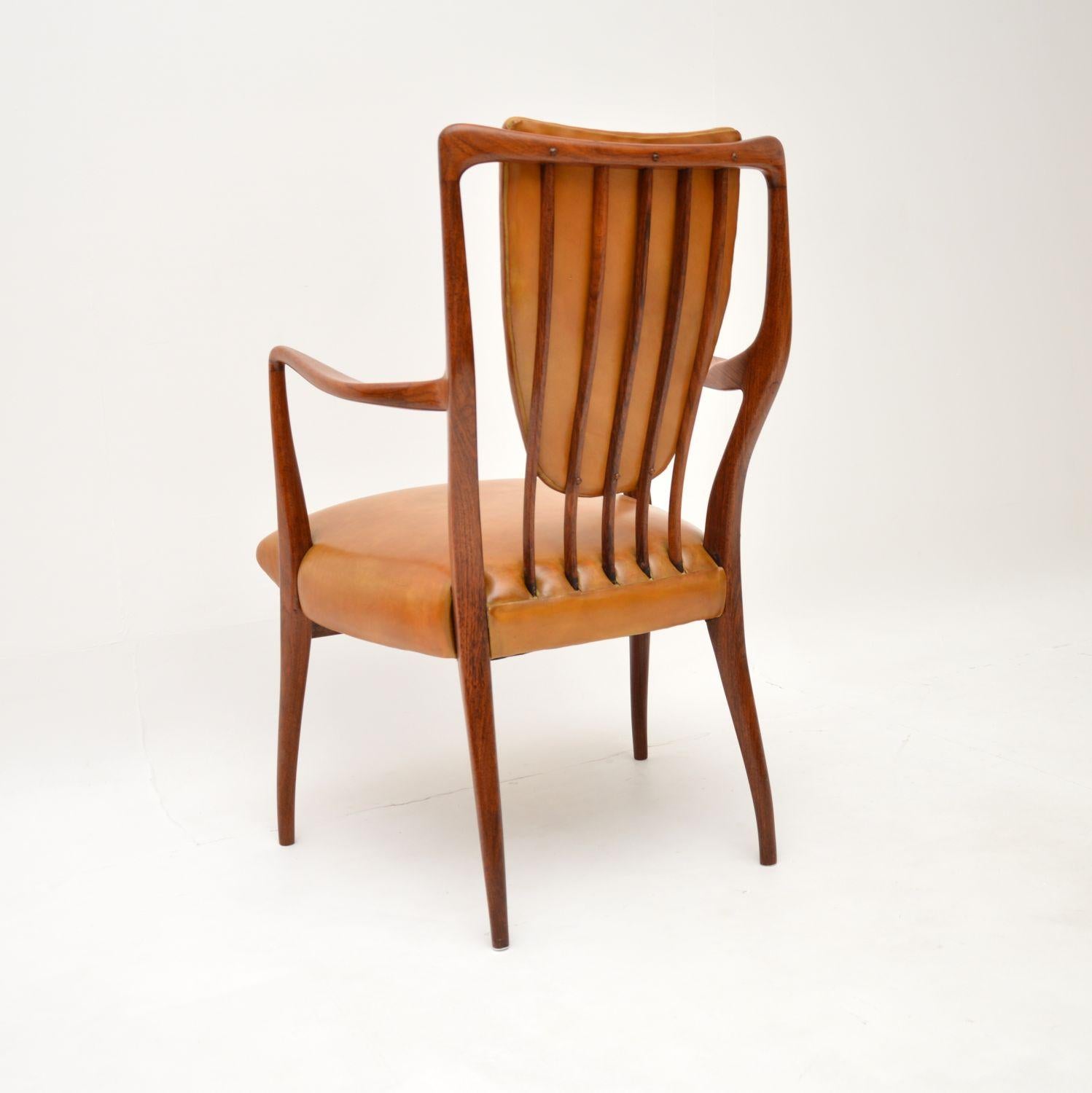 Leather Set of Eight Vintage Dining Chairs by A.J Milne