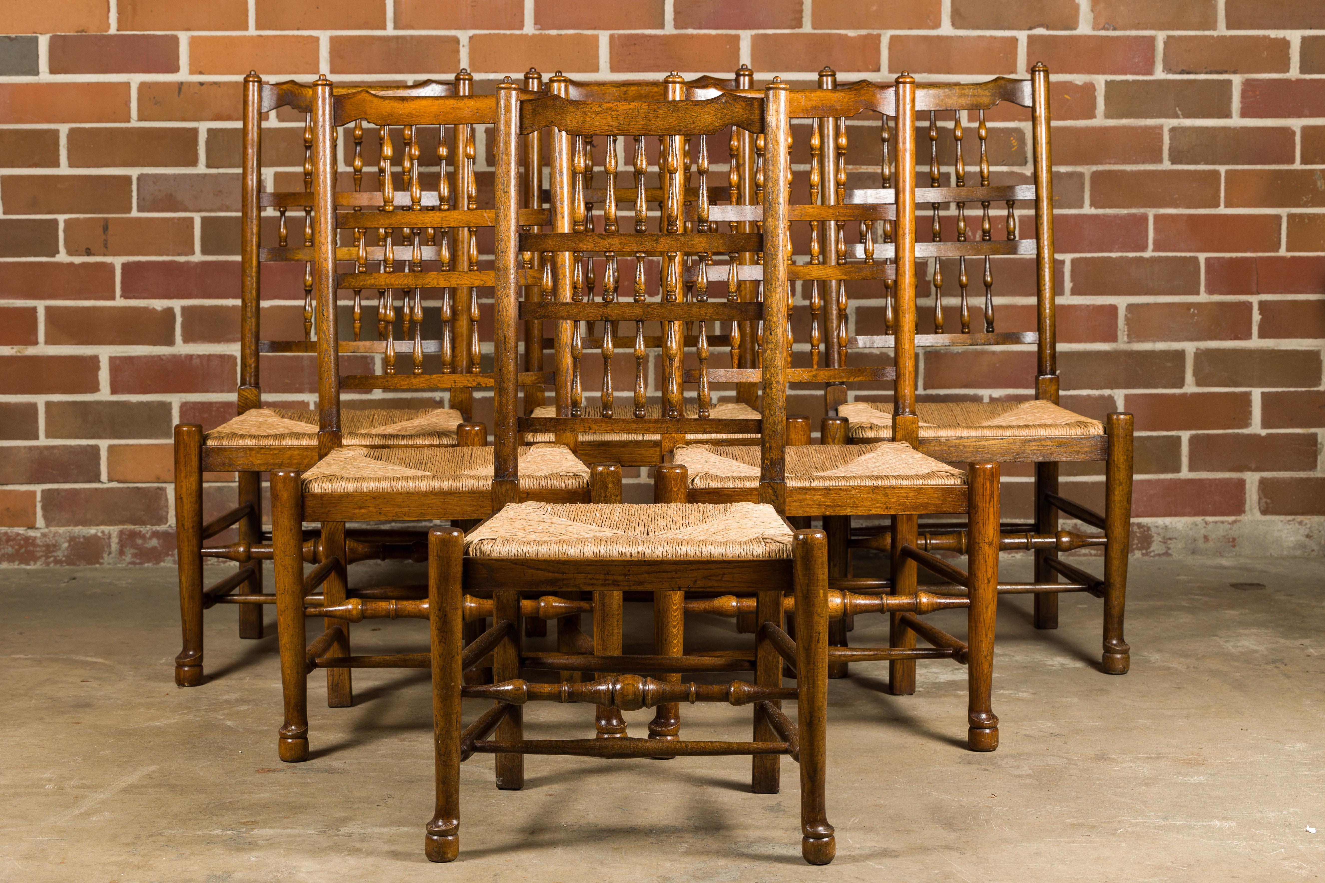 Set of Eight Vintage English Oak Dining Room Chairs with Rush Seats For Sale 6