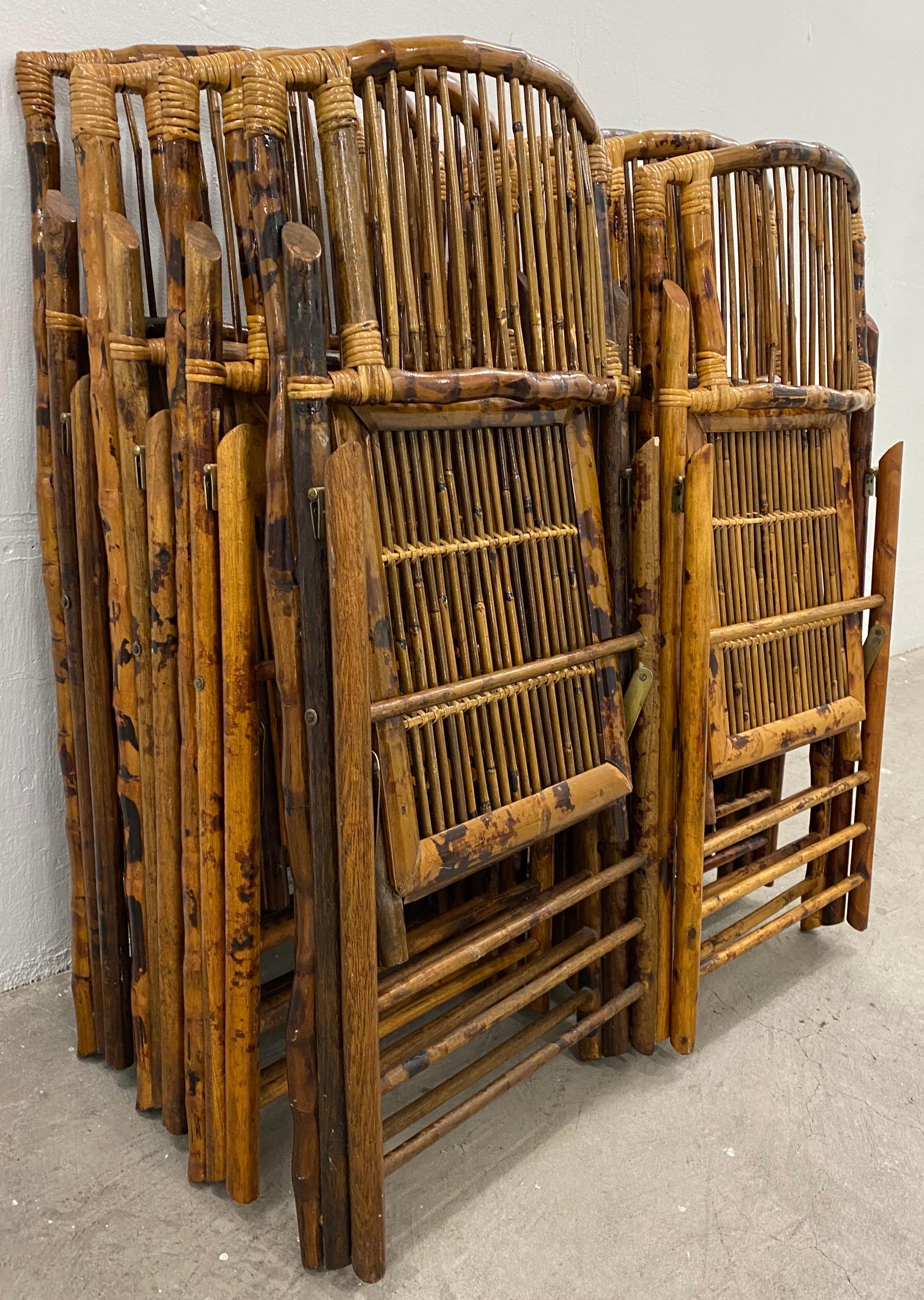 Set of eight vintage folding bamboo chairs

Dimensions 17.5