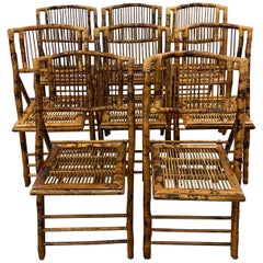 Ensemble de huit vieilles chaises pliantes en bambou