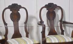 Set of eight walnut dining chairs