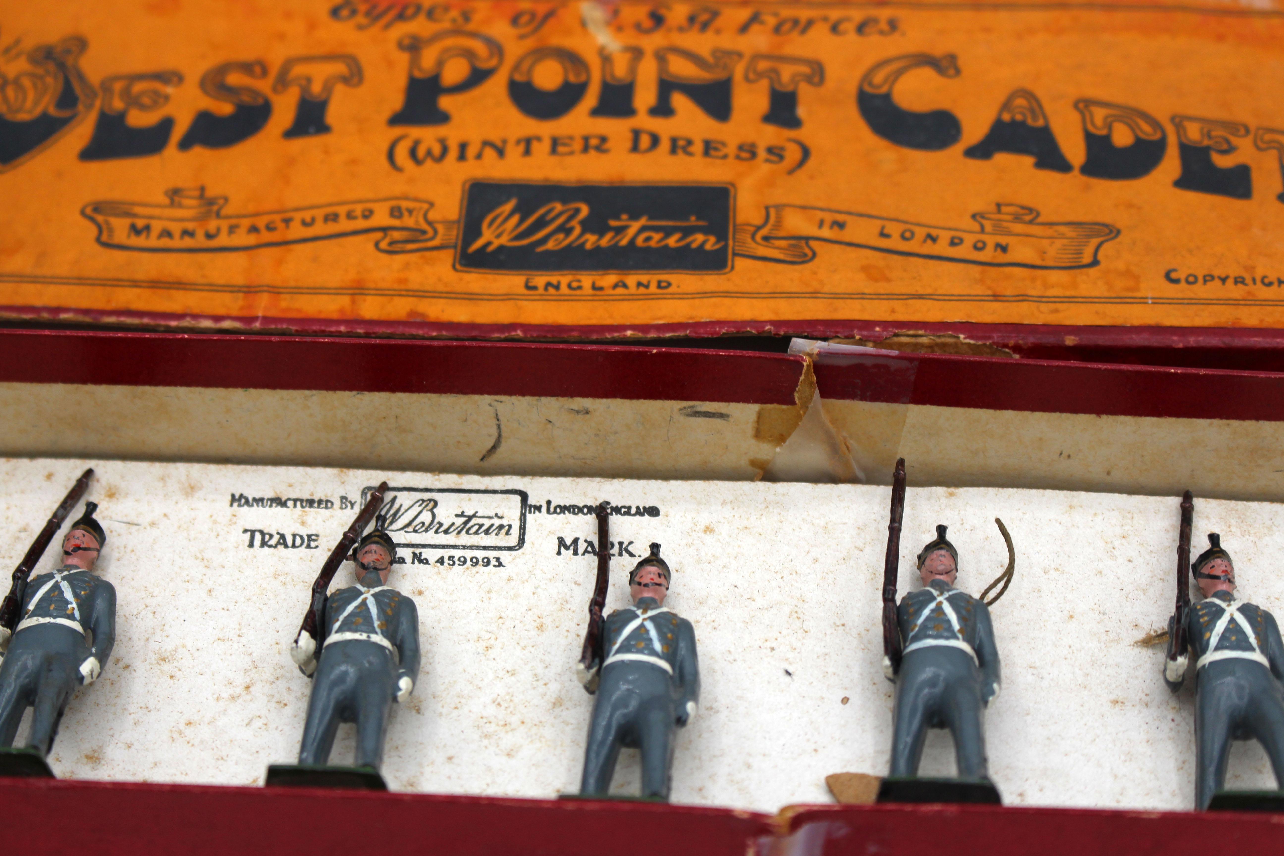 Set of 8 West Point Cadets in box by W. Britain. One with loose arm/rifle. Winter dress. Pre-WWII. Original Whisstock box, as found. Box: 14.75
