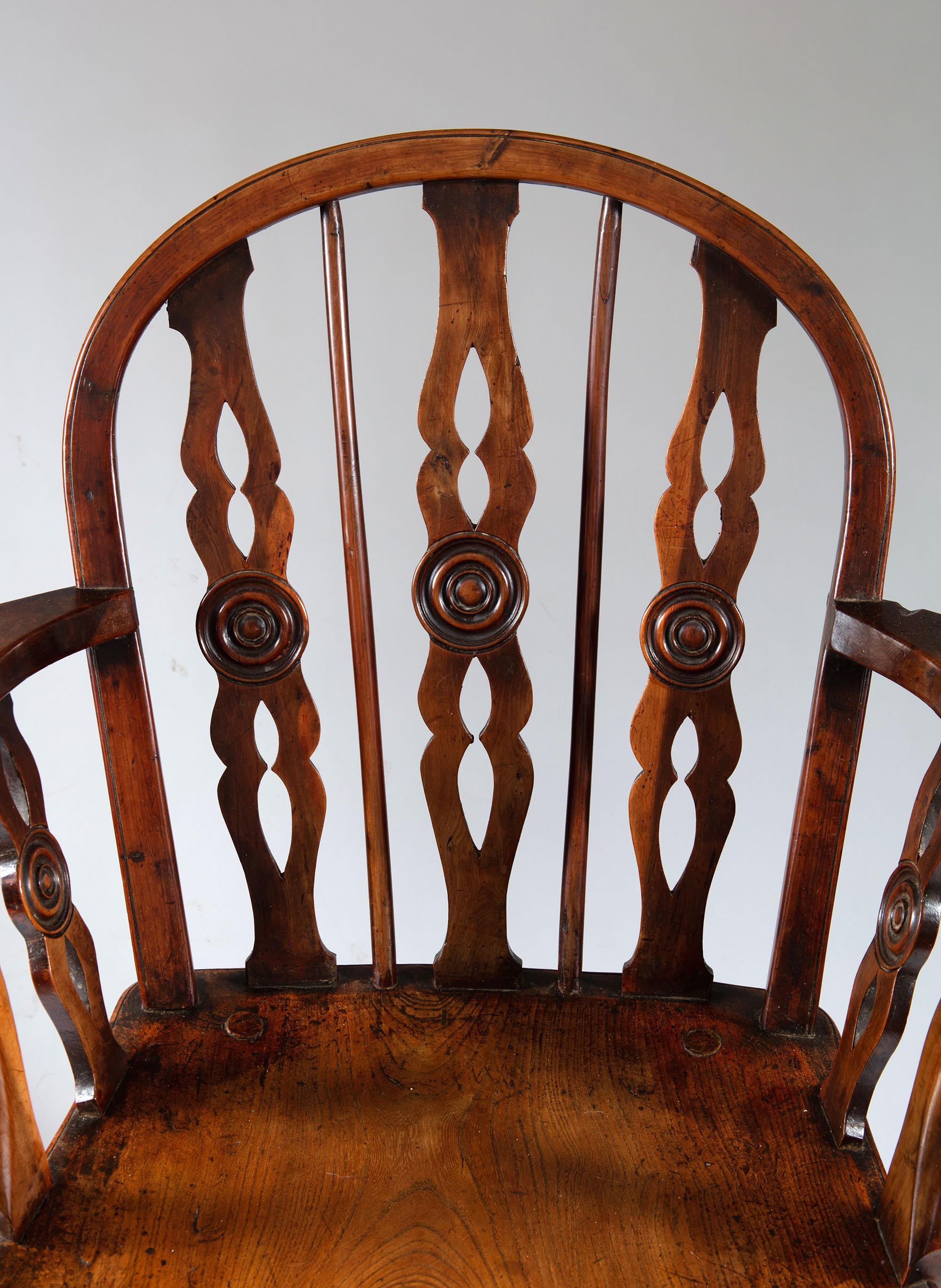 English Set of Eight Wheel Back Elm and Yew Windsor Chairs