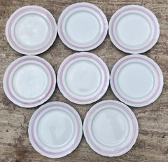 Set of Eight White and Pink Banded Plates
