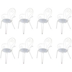 Set of Eight White Lacquered Wrought Iron and Outdoor Stackable Armchairs
