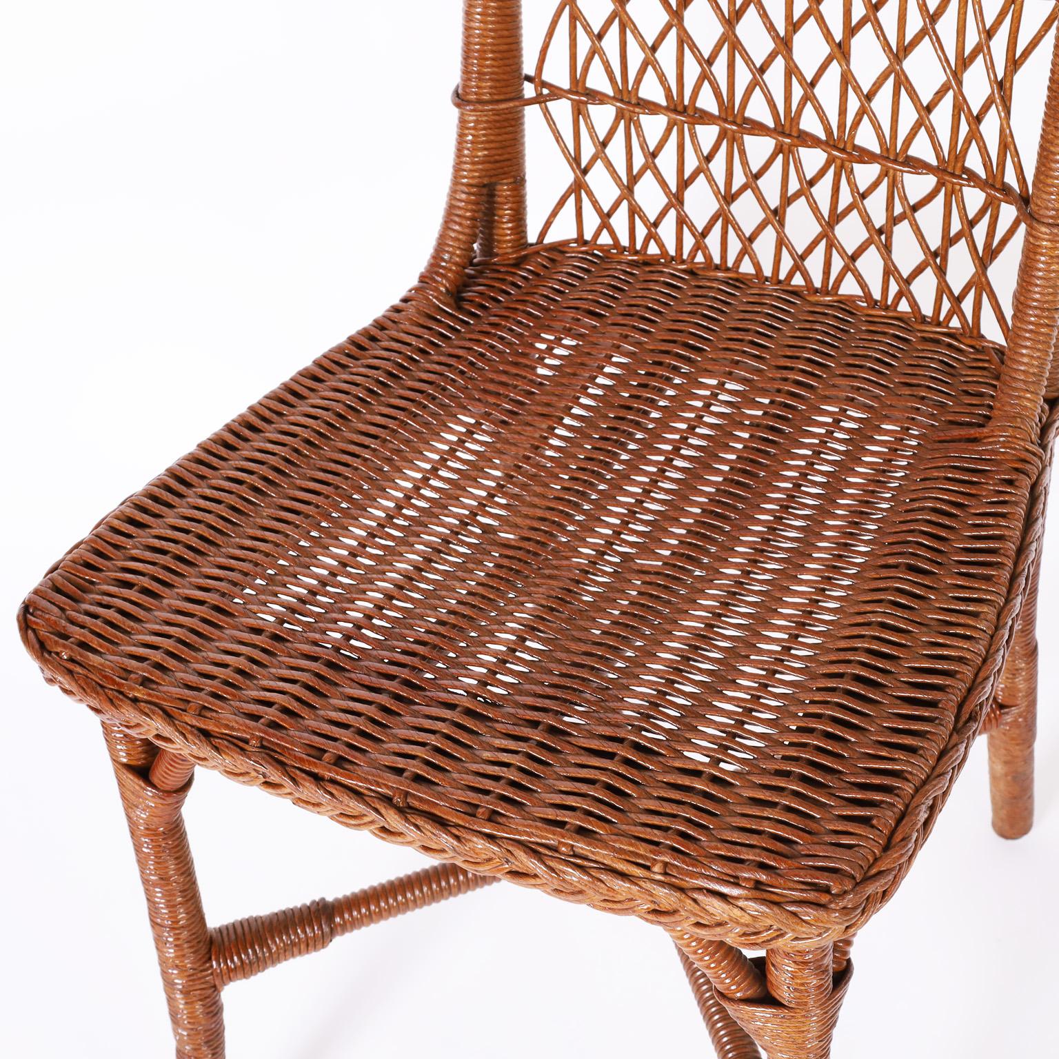 Hand-Woven Set of Eight Wicker Dining Chairs For Sale