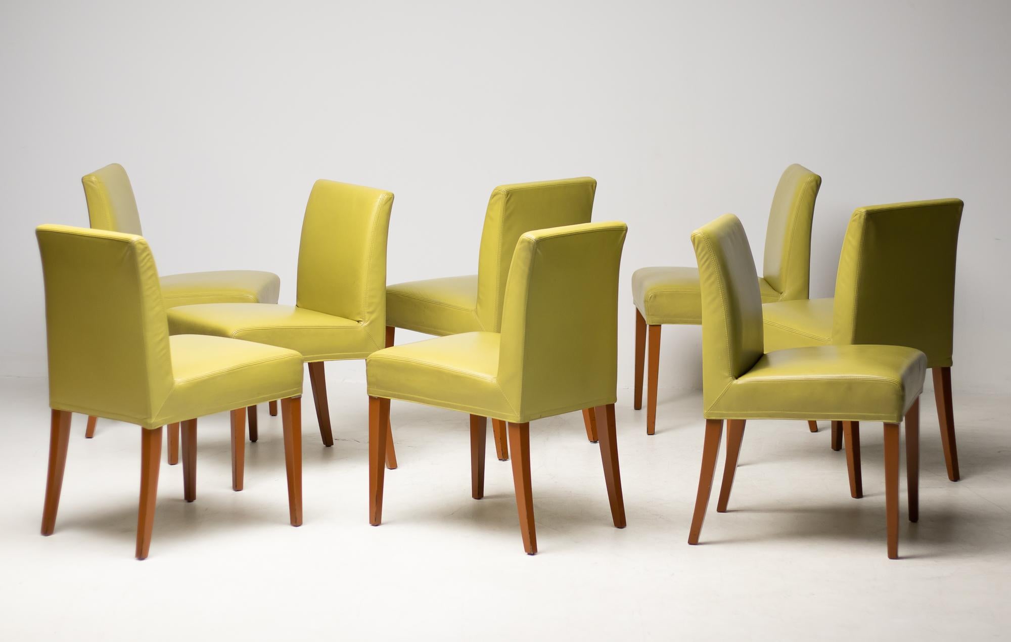 Elegant set of 8 Wittmann avocado green dining room chairs.
A timeless Classic due to its clear, straightforward lines, this chair is suitable for a wide variety of domestic and architectural uses. 
The sprung backrest and pocket-sprung seat make