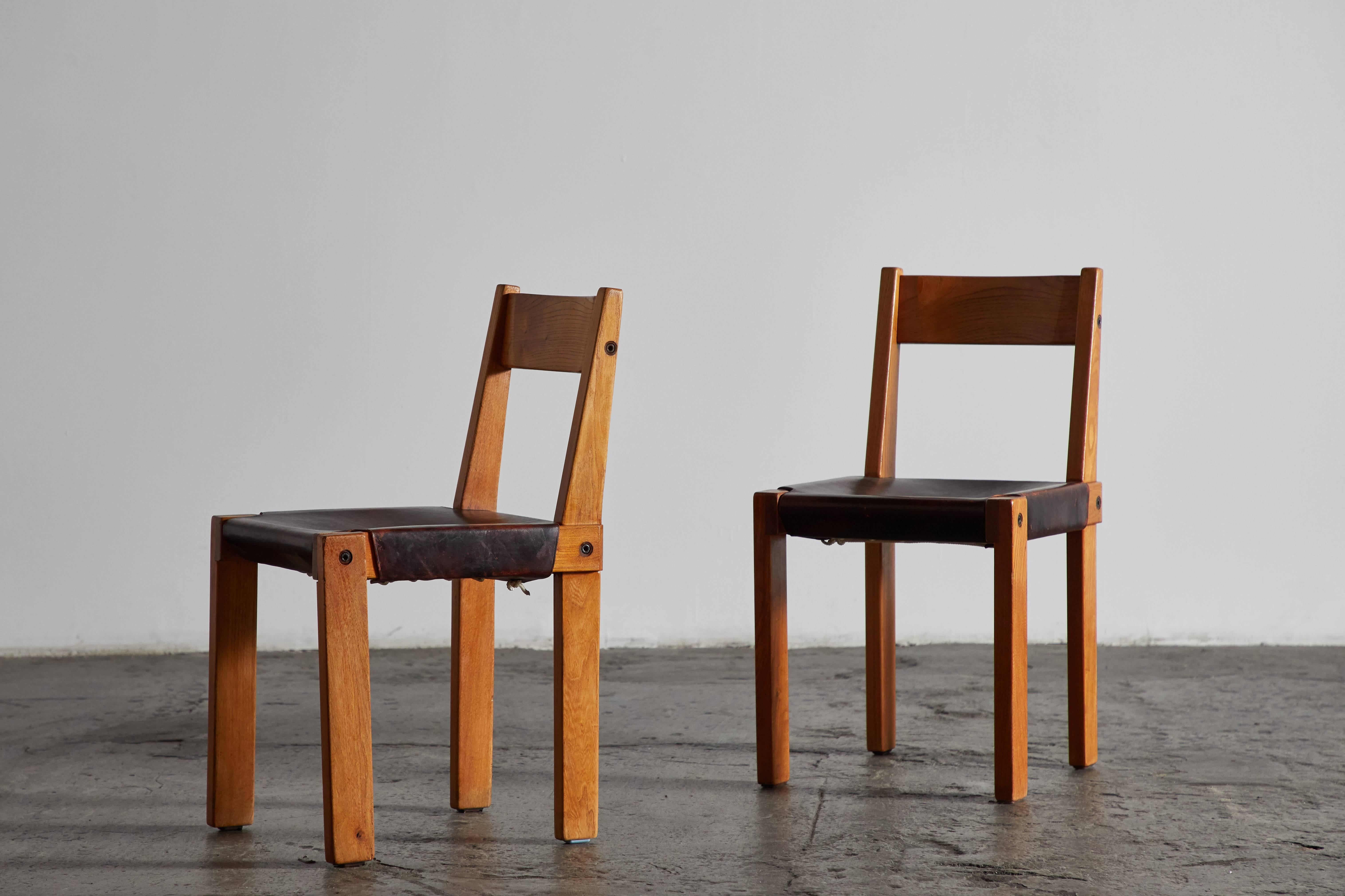 Mid-20th Century Set of Eight Wood and Leather Dining Chairs by Pierre Chapo