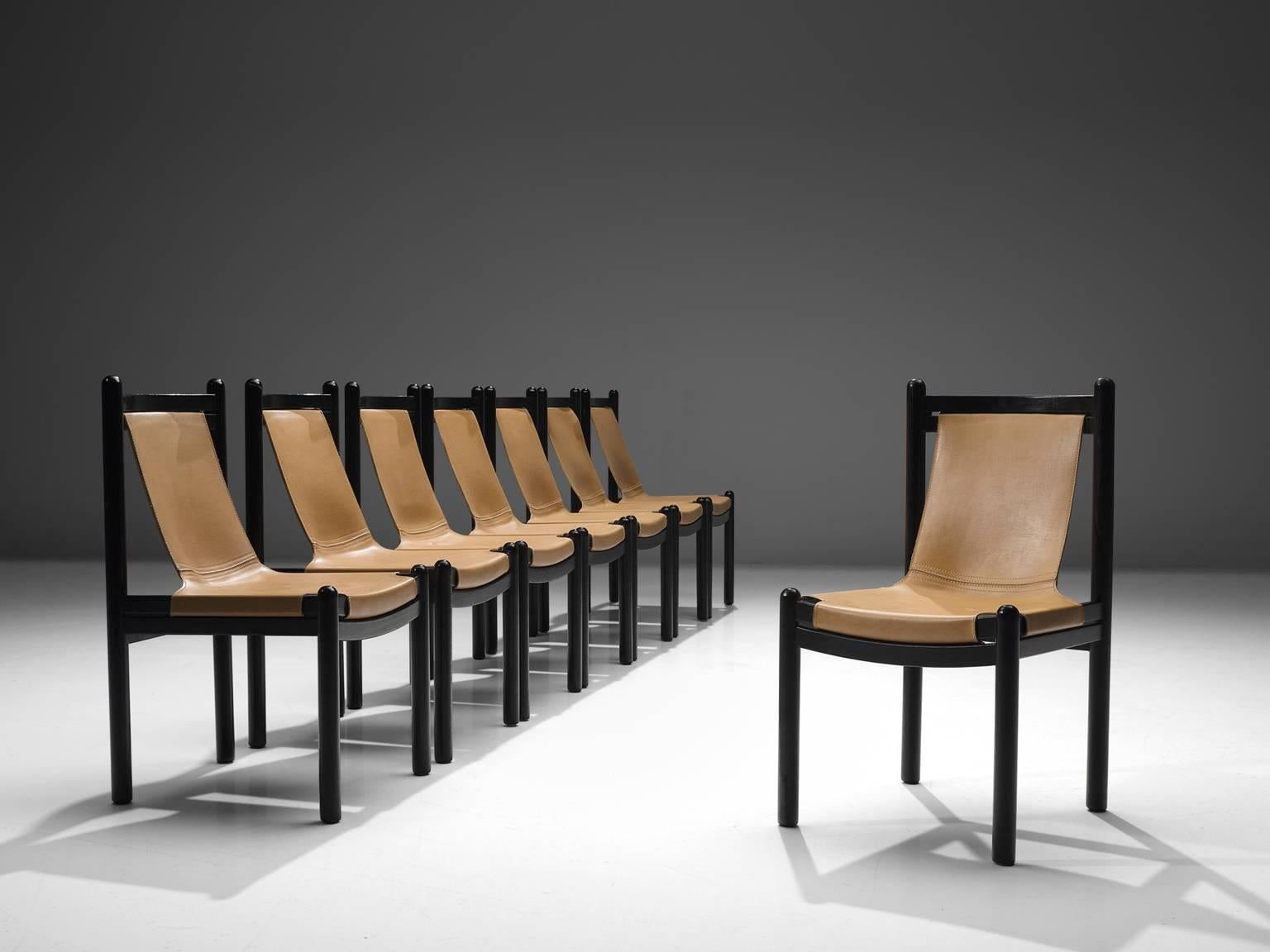 Dining chairs, wood and leather, Finland, 1950s.

These robust chairs feature a geometric, sturdy frame. The joints are all very visible, which enhances the design of these Finnish chairs and shows traits of the design of Ilmari Tapiovaara. The