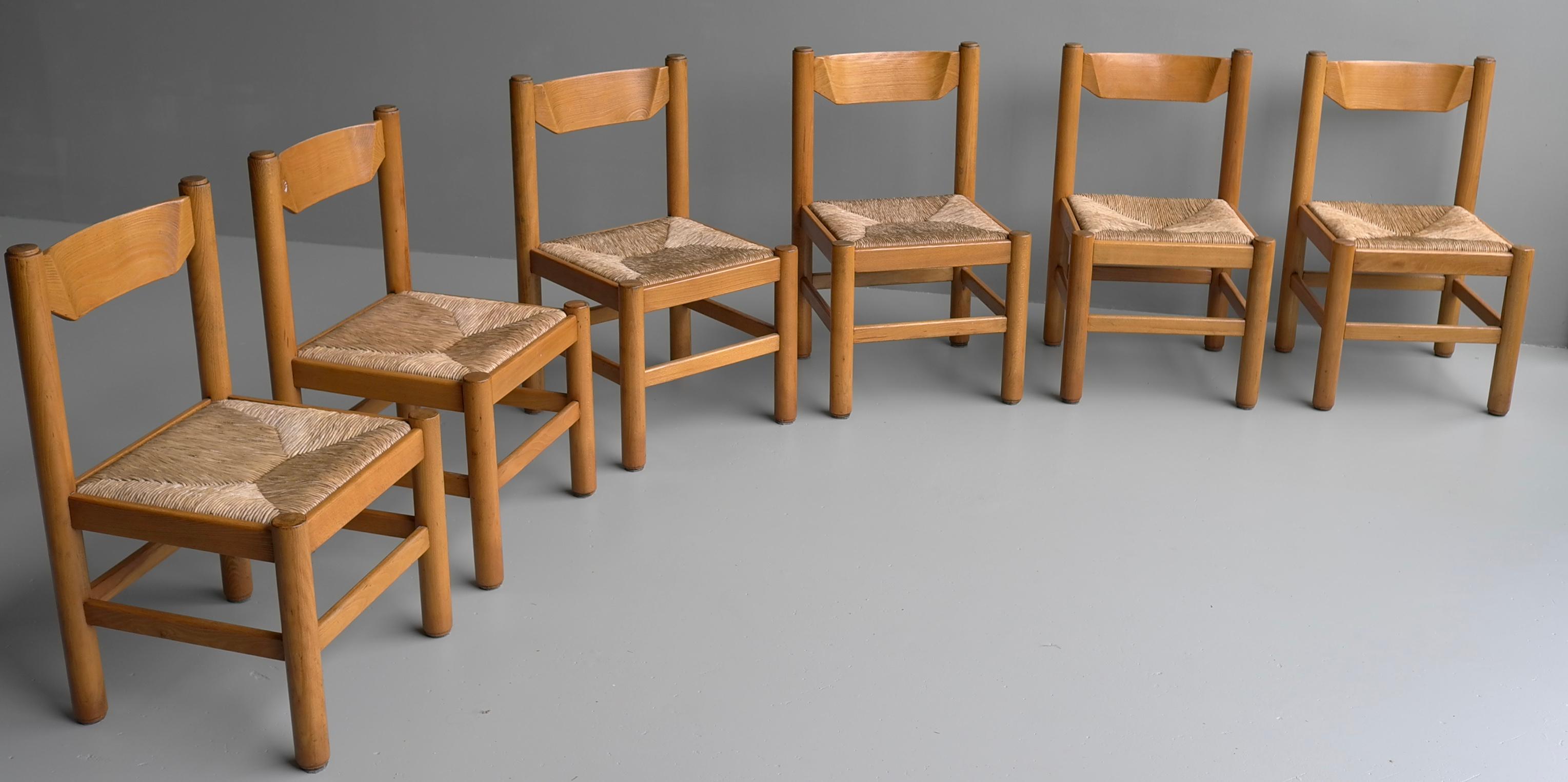Set of eight wooden dining chairs in style of Charlotte Perriand, France, 1960
Solid heavy wooden chairs with cane or rush seats. The pictures shown only six chairs but we have 2 more. The listed price is for 8 pieces. We also have an identical set